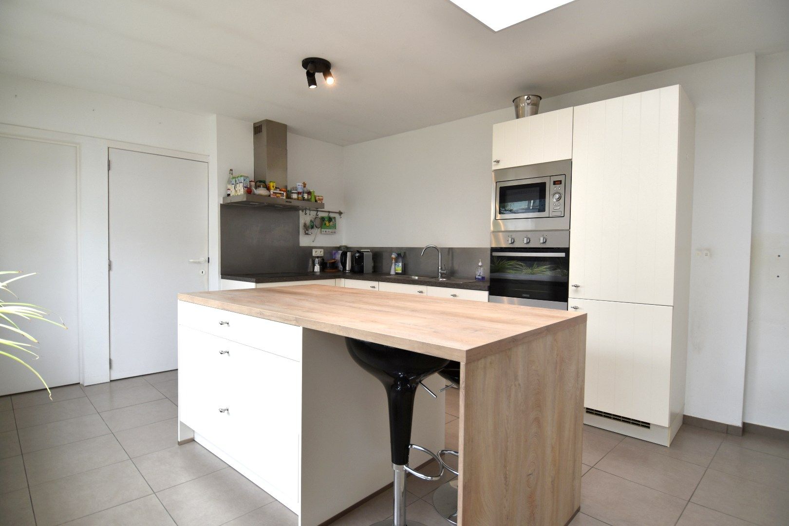 Alleenstaande woning met 3 slaapkamers, tuin én garage te koop in centrum-Kuurne foto 3
