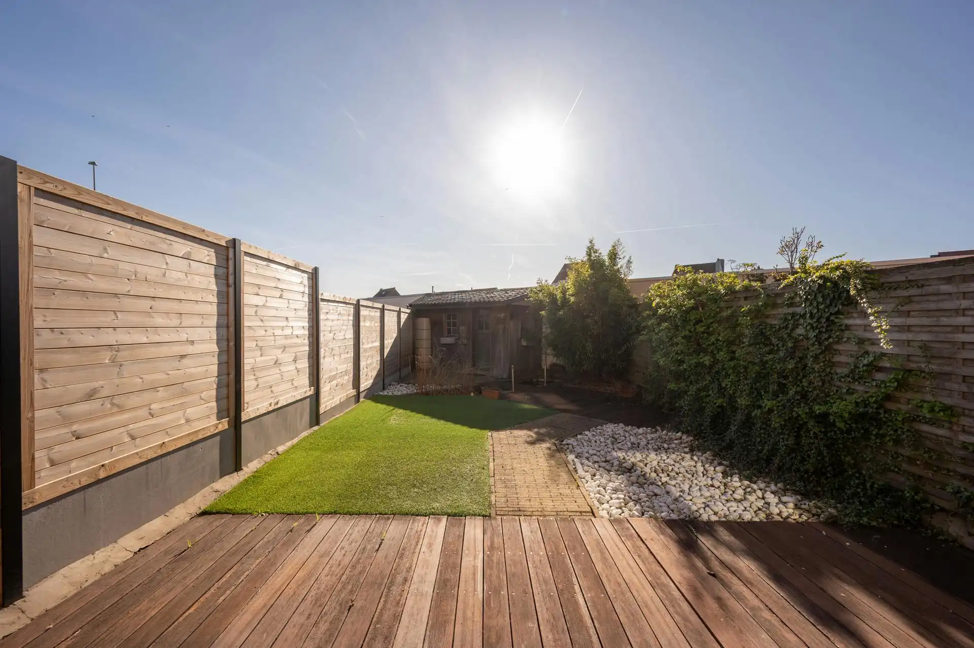 Rustig gelegen huis met zonnige tuin te koop in Heist foto {{pictureIndex}}