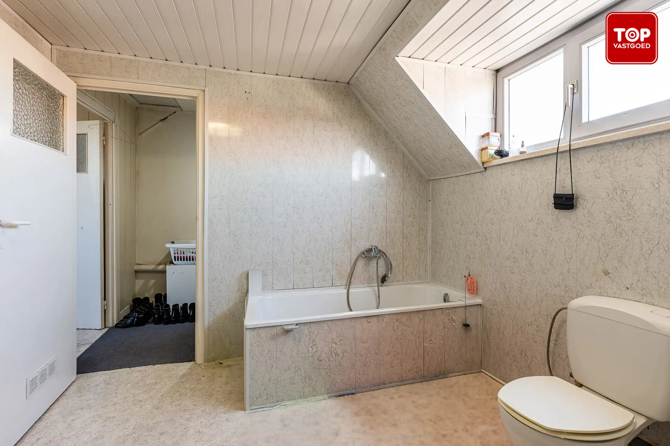 Woning met handelsgelijkvloers op een commercieel interessante ligging.  foto 22