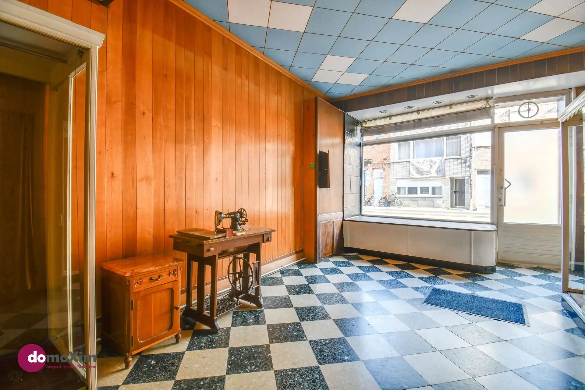 Te renoveren stadswoning met zuid-gerichte tuin en garage foto 4
