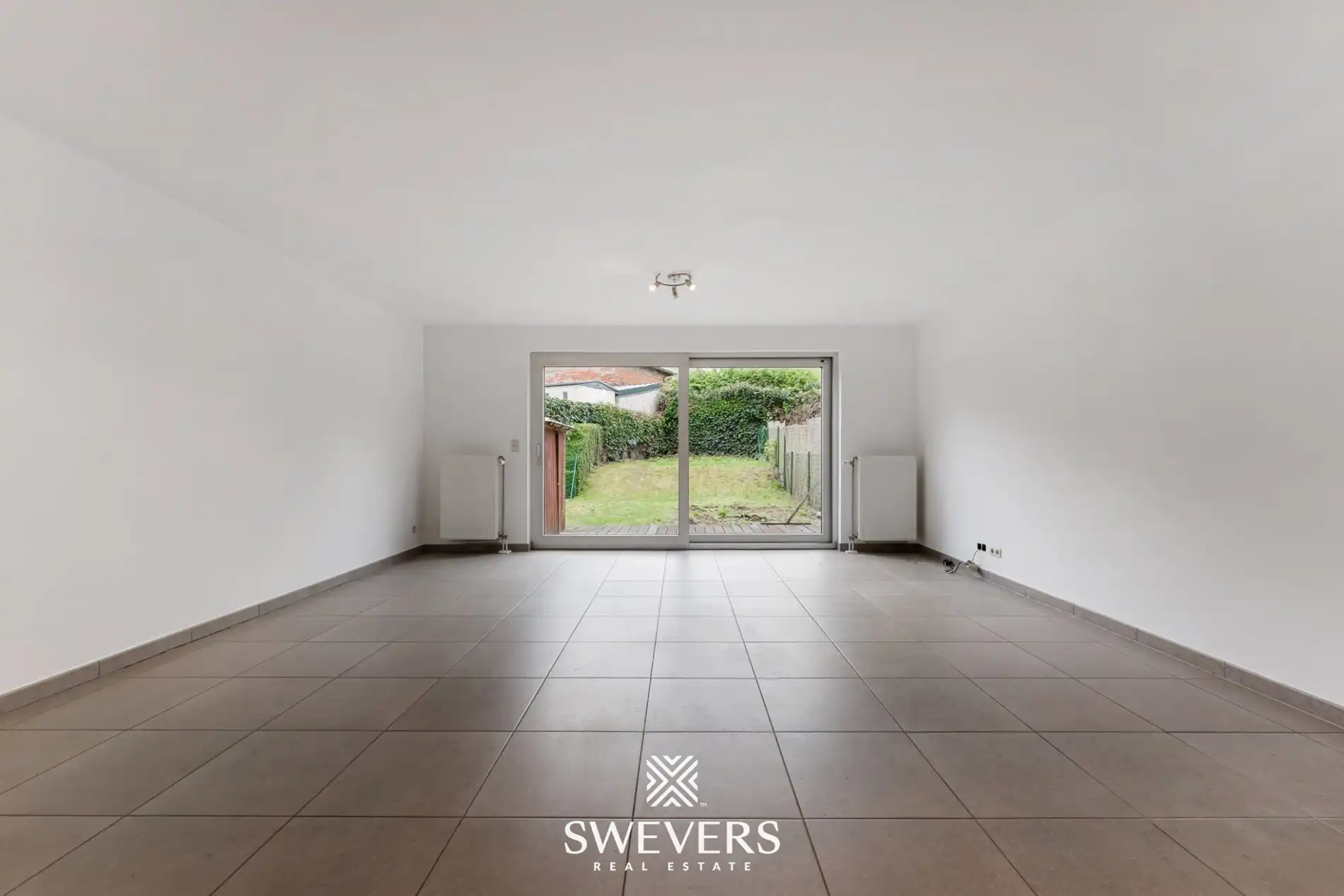 Ruim duplex appartement met 2 slaapkamers en tuin foto 3