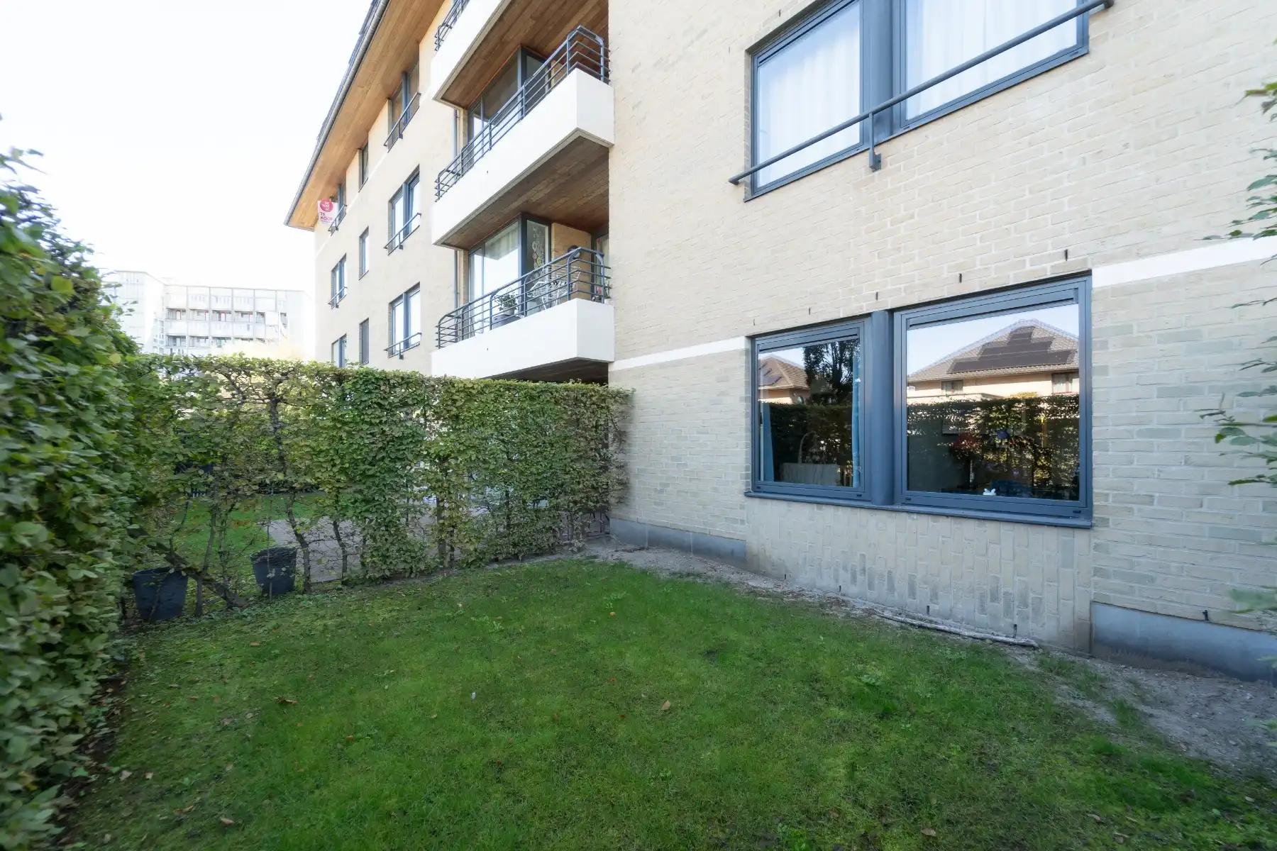 Gelijkvloers 2-slpk appartement met tuin! foto 24