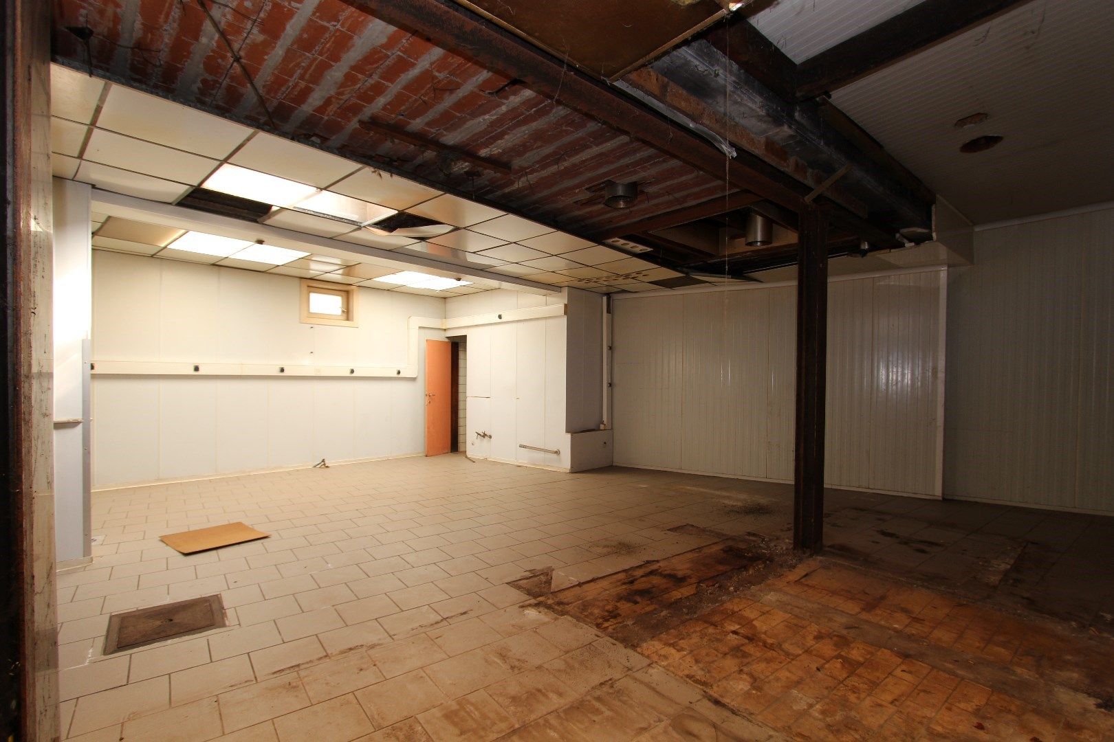 Grote woning met handelsruimte aan de Grote Markt van Tongeren foto 7