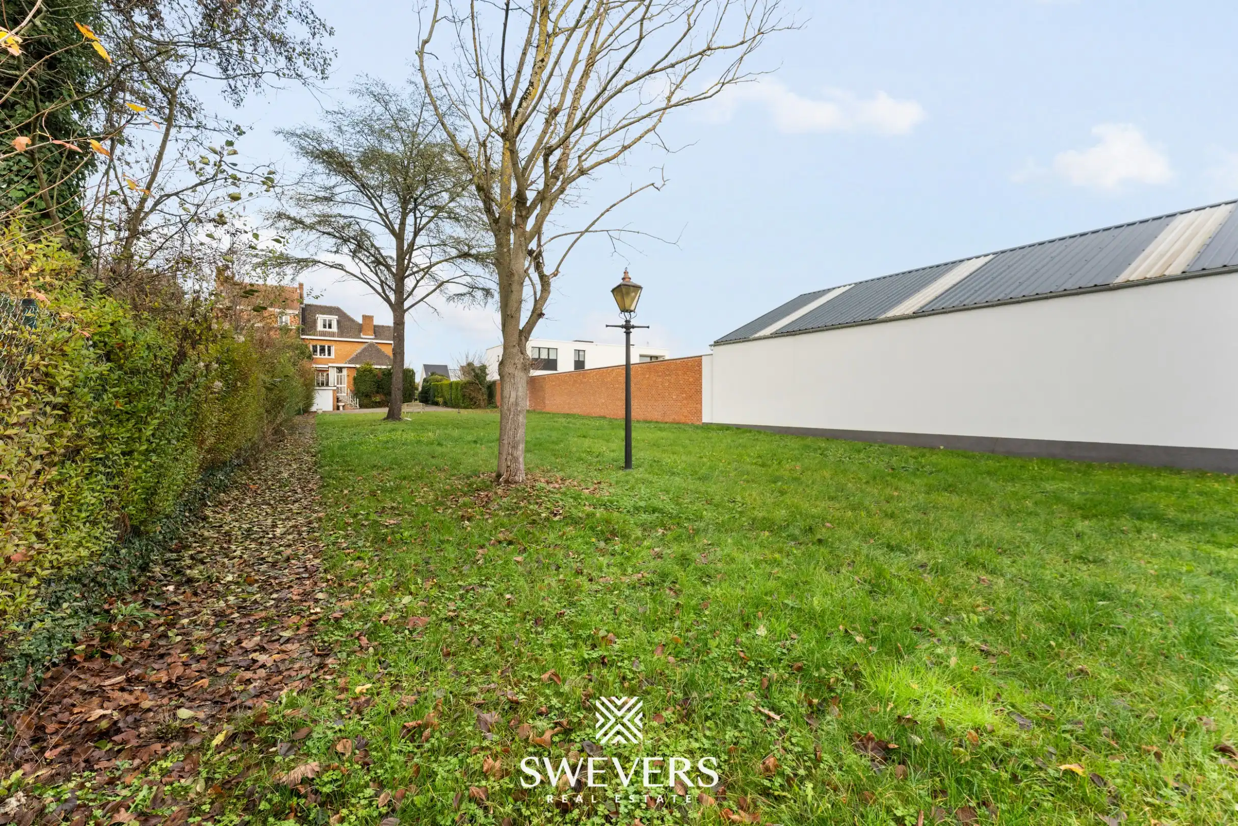 Karaktervolle halfopen bebouwing met uitzonderlijk potentieel en zonnige tuin nabij Hasselt centrum foto 32