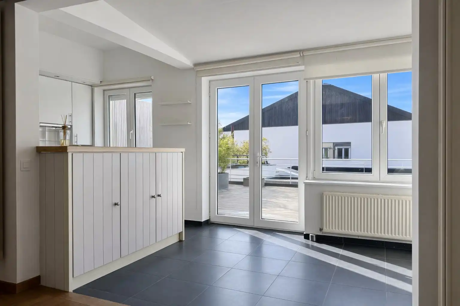 Ruime triplex met 3 slaapkamers in centrum Heist foto 5