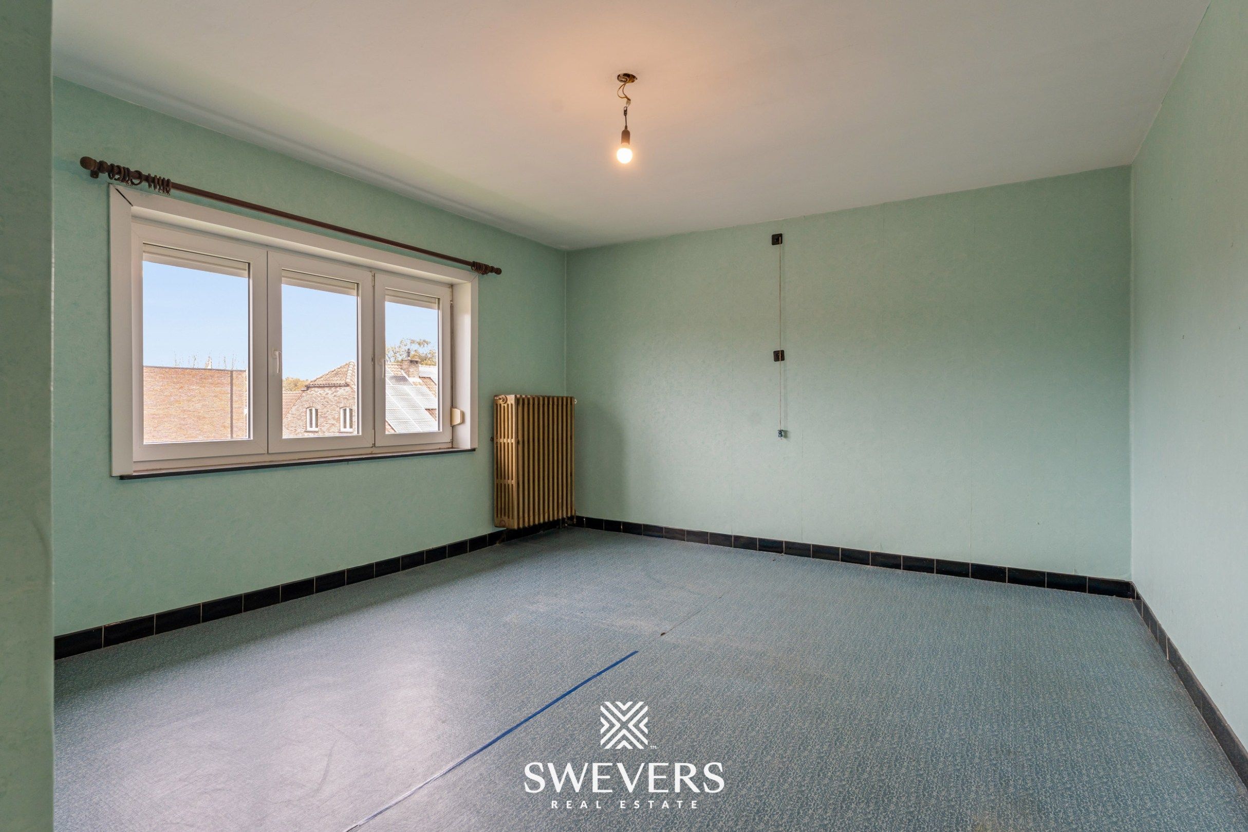 Ruime open bebouwing met potentieel en zuidgerichte tuin in rustige wijk van Houthalen foto 13