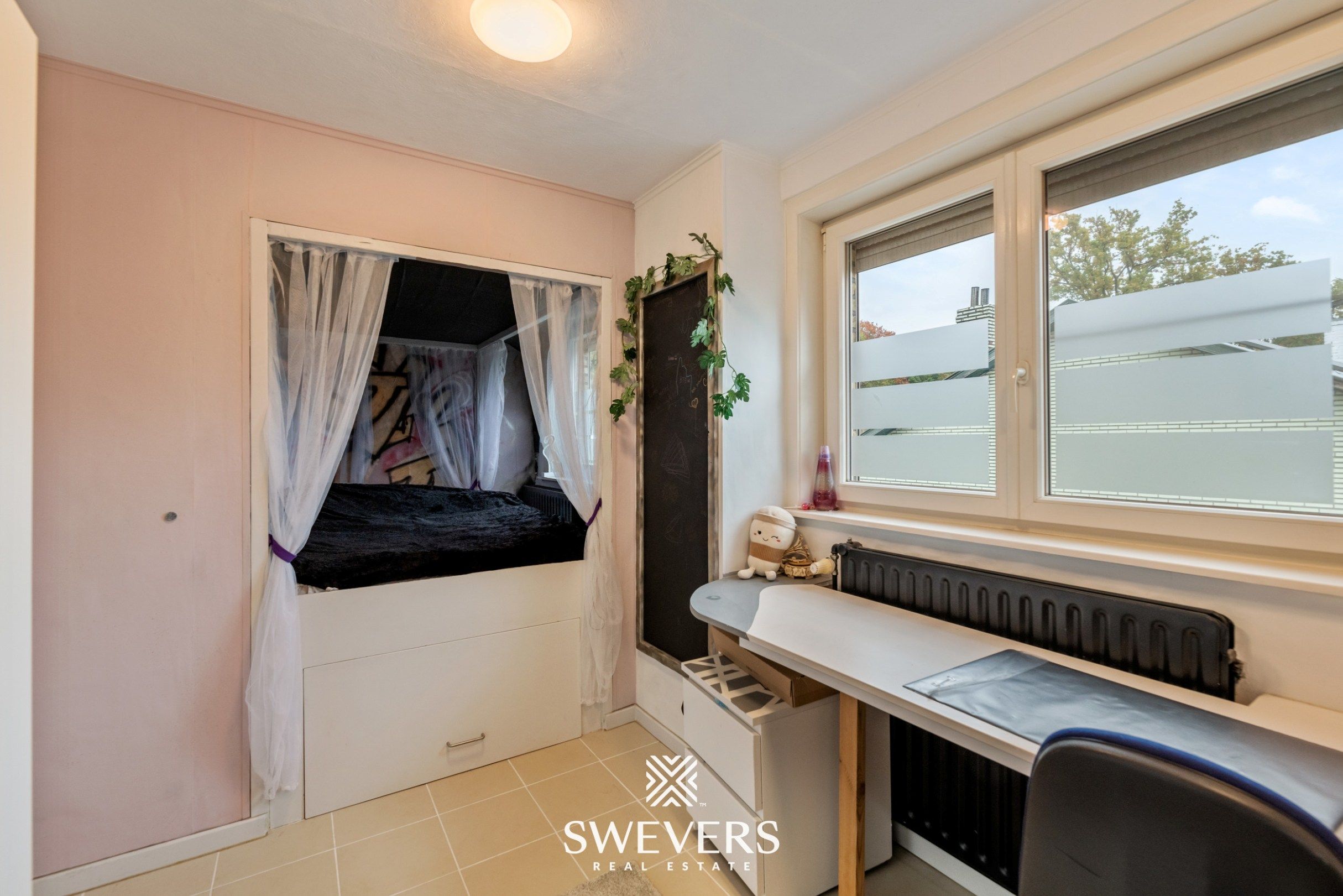 Instapklare gezinswoning met 3 slaapkamers, ruime kelder en zuidgerichte tuin in Beringen foto 15