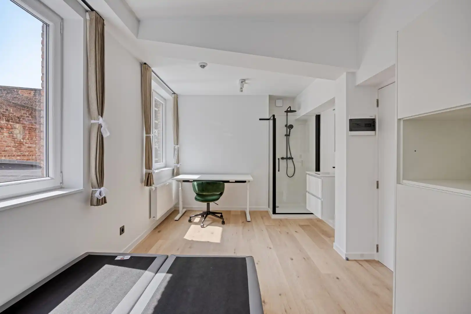 Volledig gerenoveerde studentenkamer in residentie met 15 studentenkamers en een 1slaapkamer appartement in hartje Leuven - EPC label A! foto 4