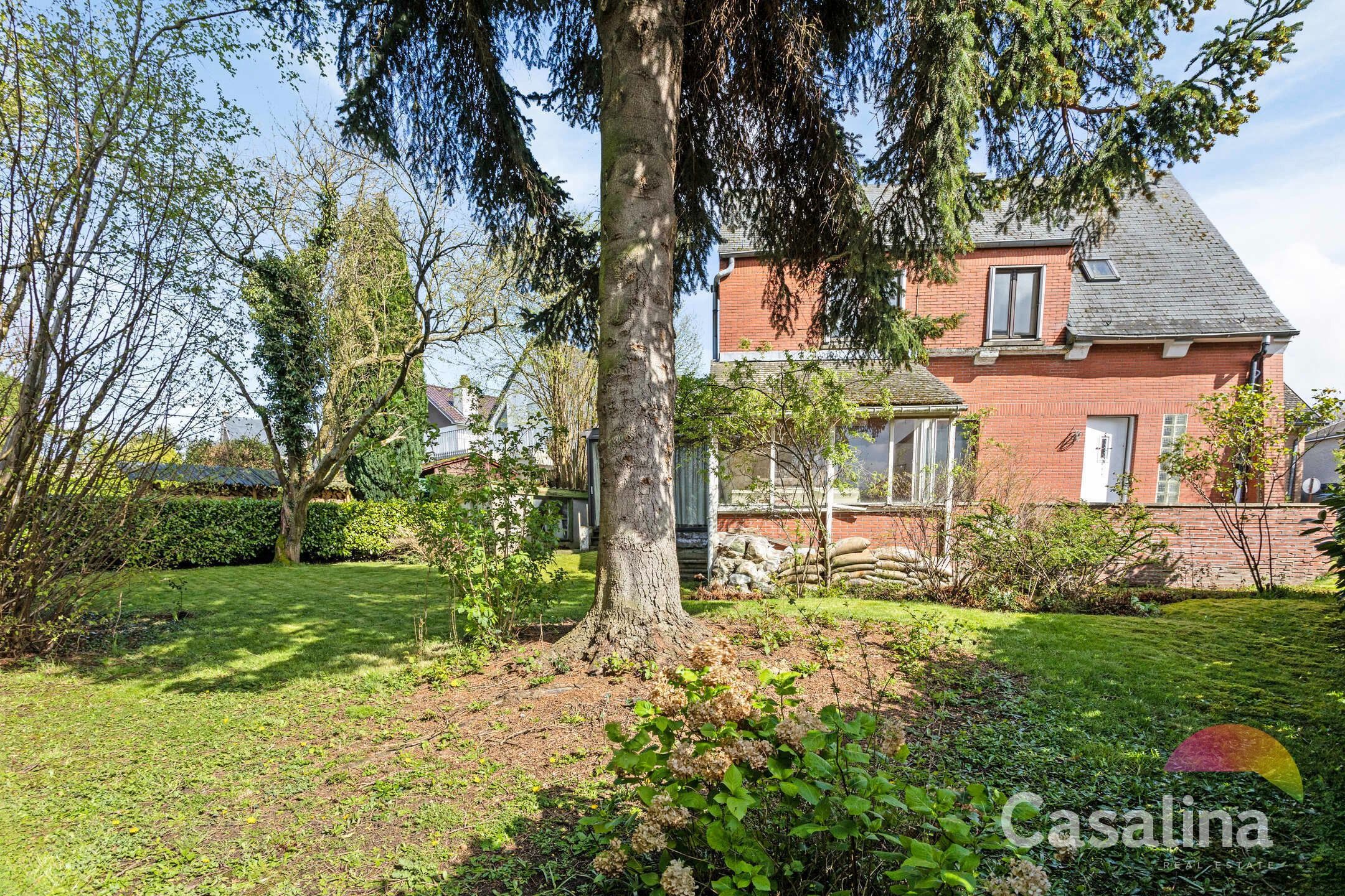 Viergevelwoning van 209m² met tuin foto 33