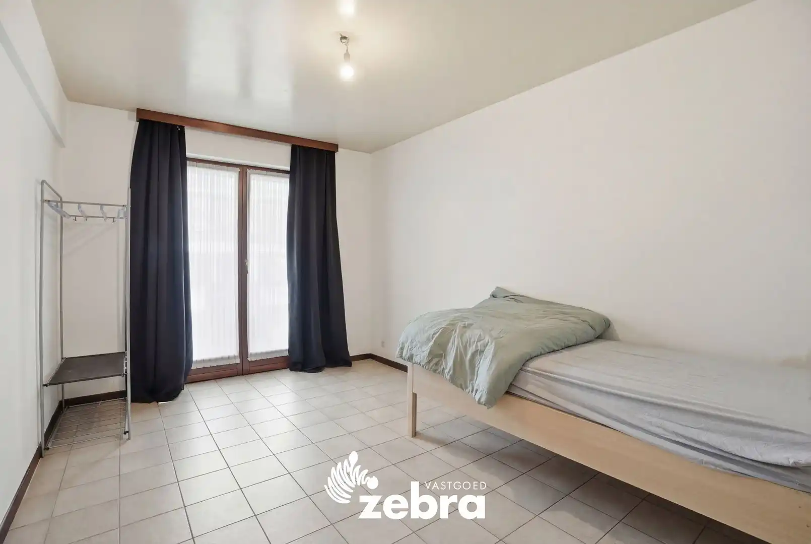 Gelijkvloers 2-slaapkamerappartement met terras en garage in centrum Tielt! foto 12