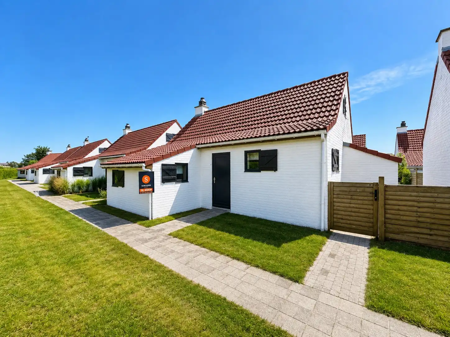 Bemeubelde visserswoning met tuin gelegen in Holiday Village te De Haan. foto 11
