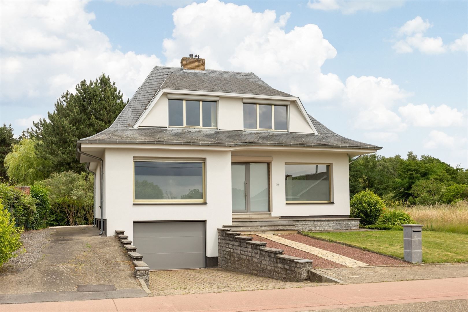 Hoofdfoto van de publicatie: Stijlvolle open bebouwing met tuin, nabij 't dorp!