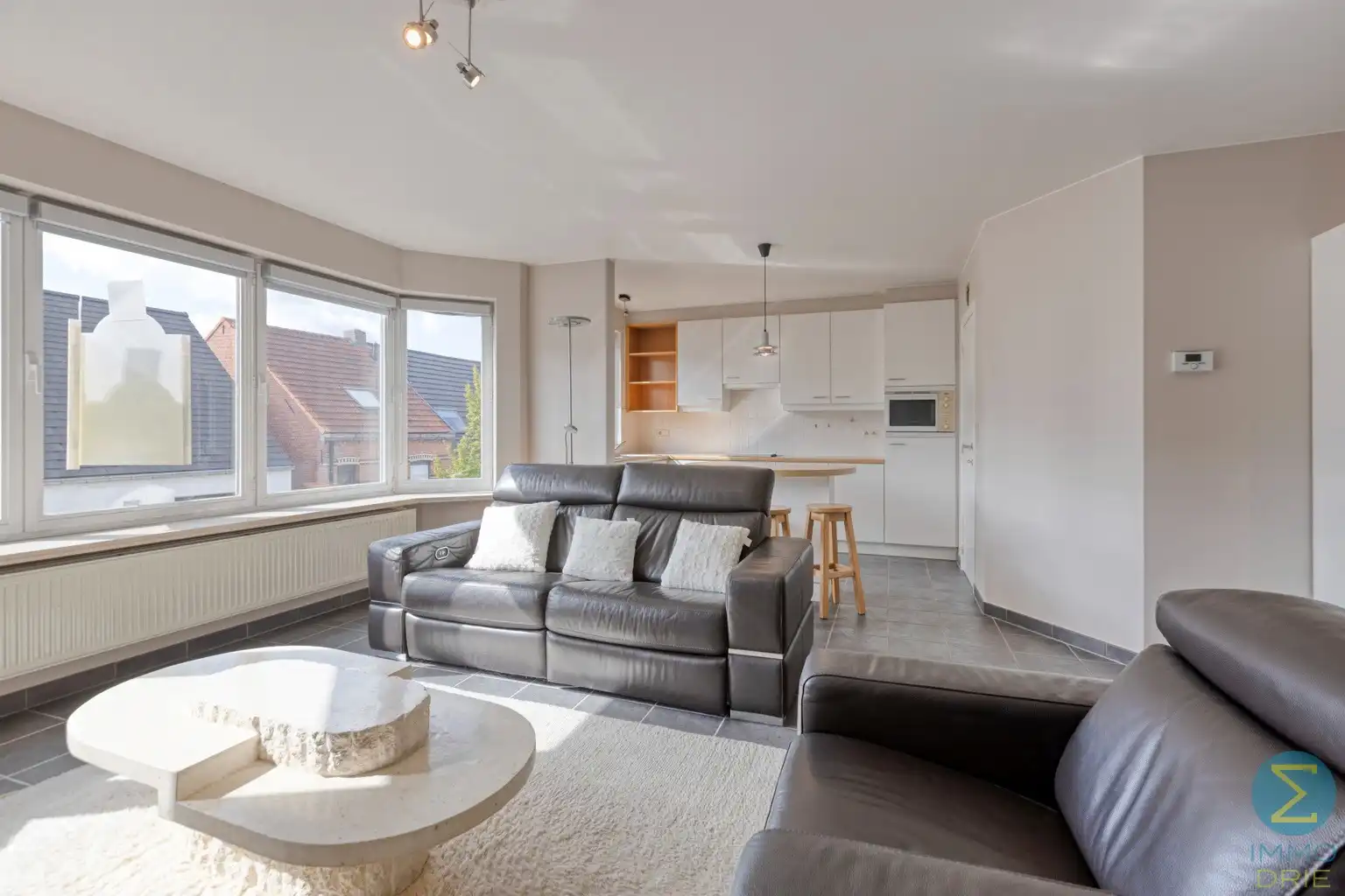 Ruim 2-slaapkamerappartement met balkon, garage én kelder  foto 2