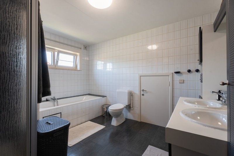 Energiezuinige woonhuis met 3 slaapkamers op een perceel van 6 a en 15 ca. foto 40
