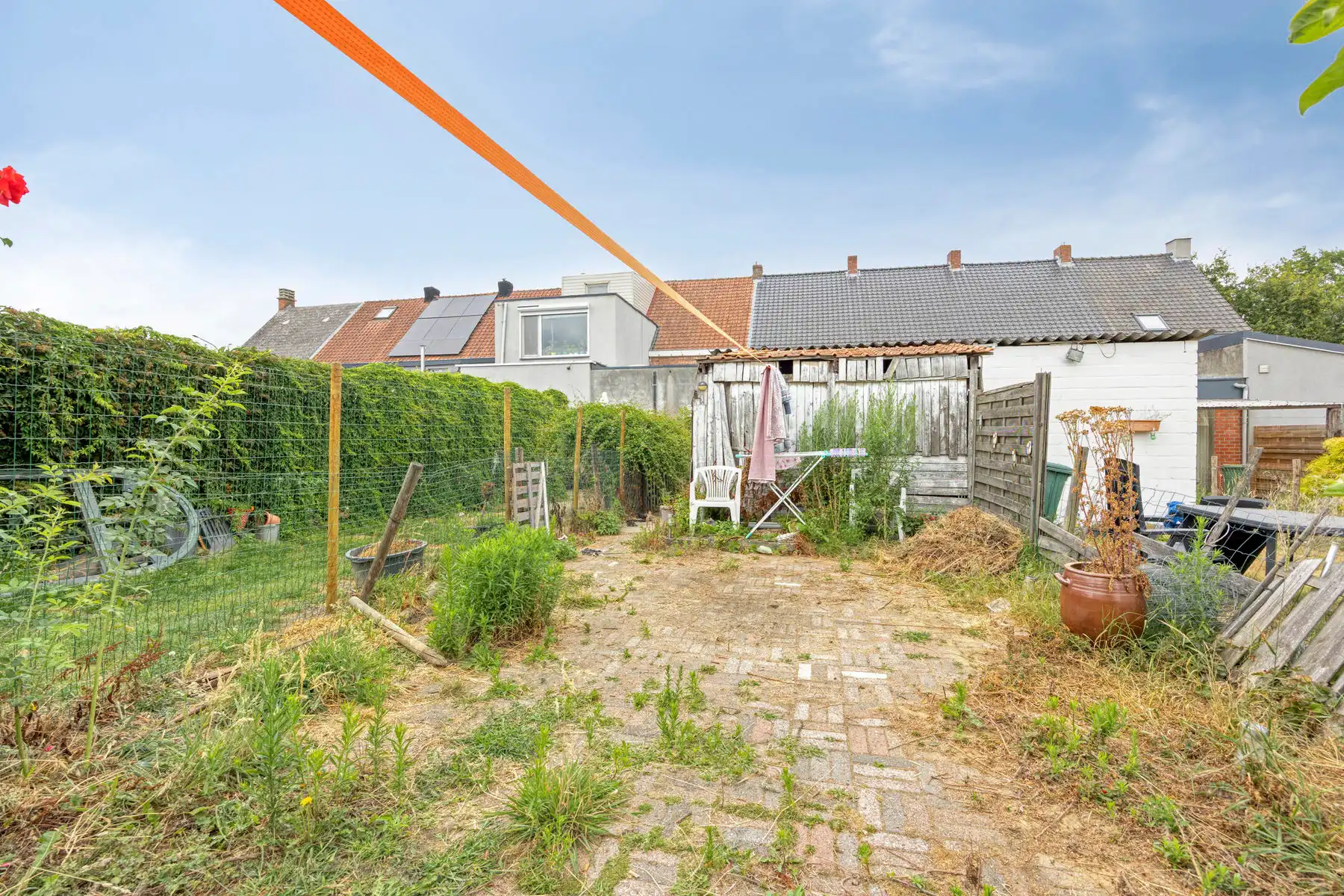 Rijwoning met 2 slaapkamers, tuin en parkeerplaats foto 12