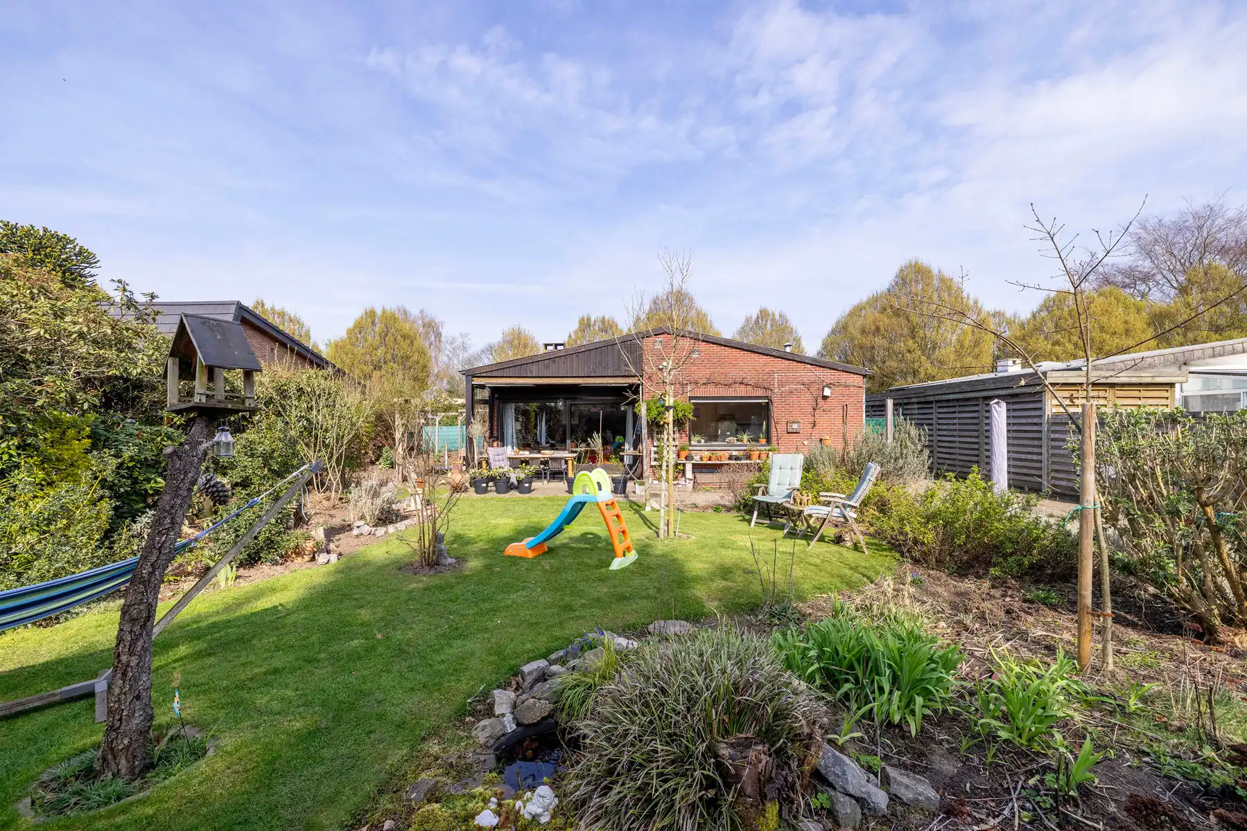 Hoofdfoto van de publicatie: Laagbouwwoning met 2/3slpk, tuin en garage