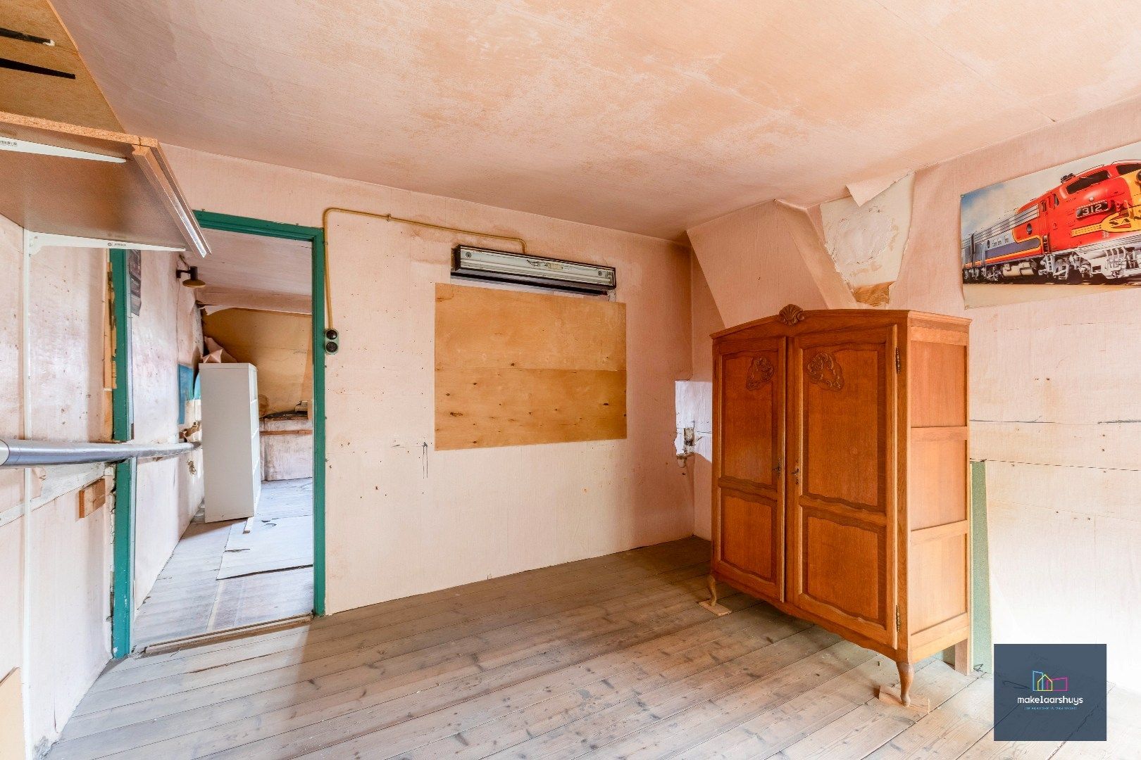 Charmante op te frissen rijwoning met ruime stadstuin  foto 16