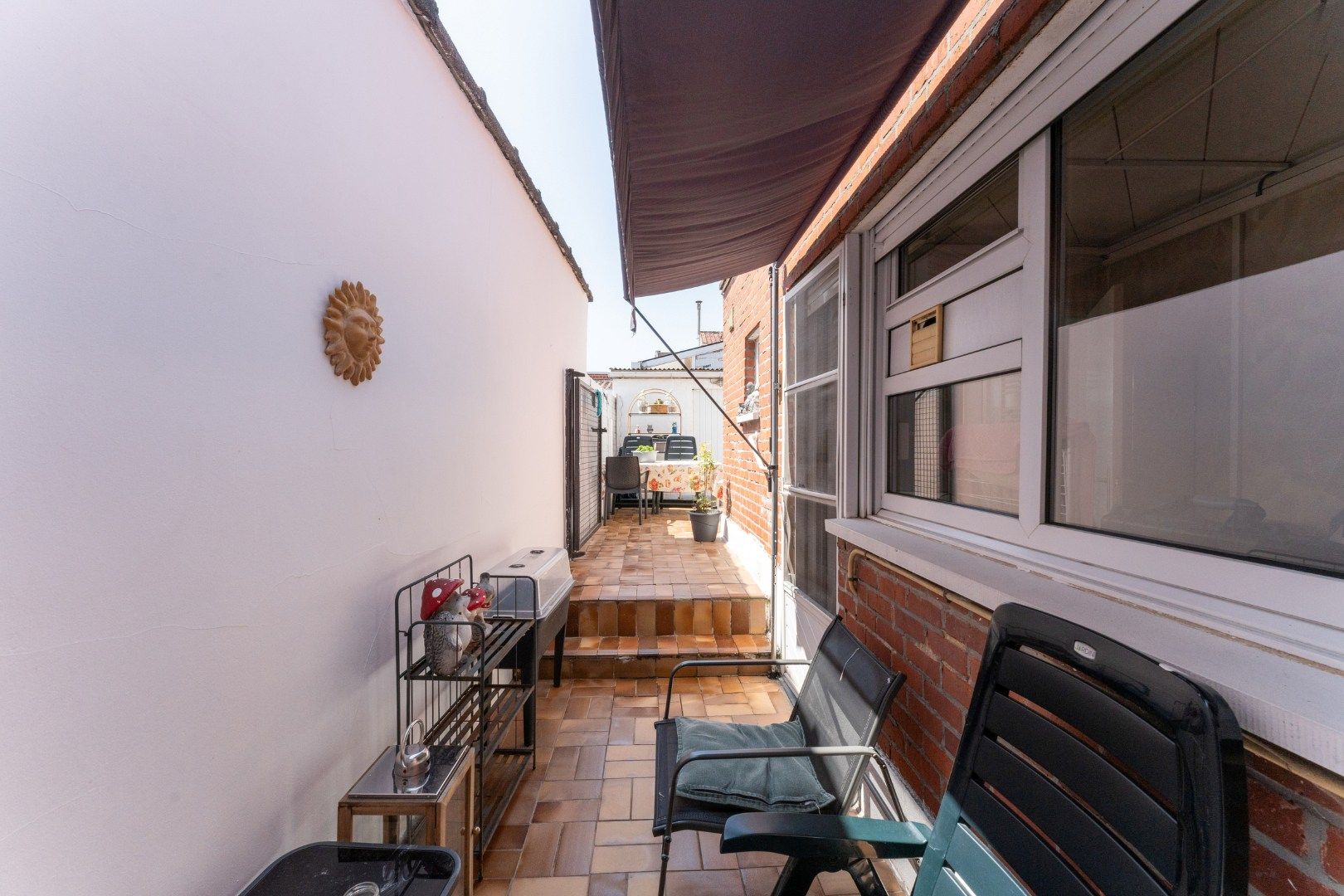 Centrale rijwoning met drie slaapkamers en terras in hartje Roeselare foto 8