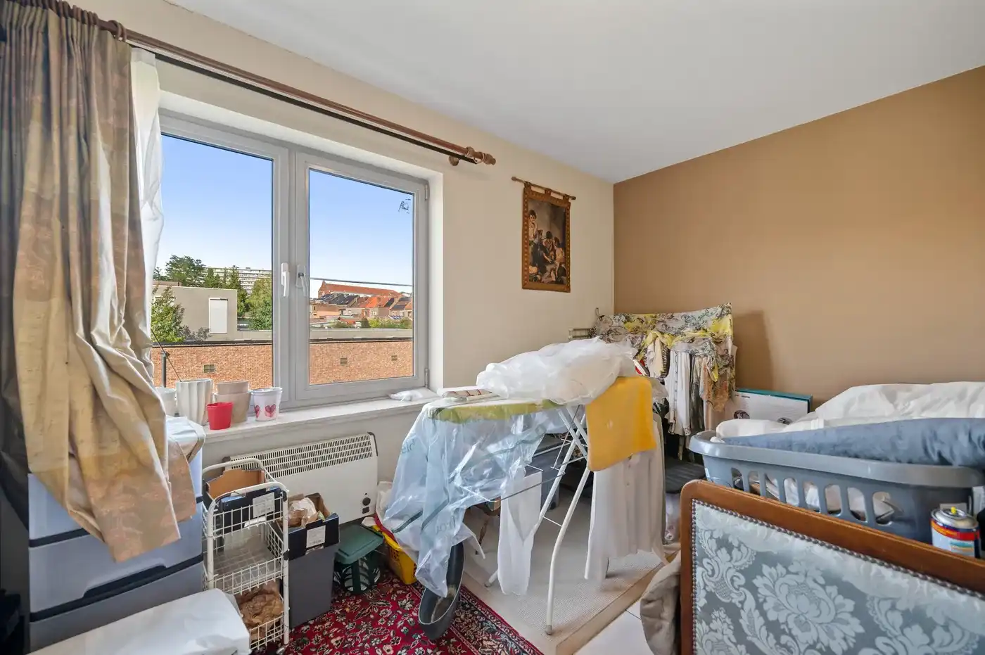 Ruim appartement met veel lichtinval, 2 slaapkamers, garage en kelder foto 12