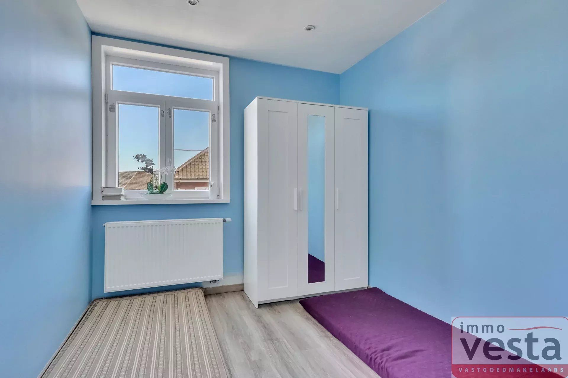 Ruime rijwoning nabij centrum Sint-Truiden foto 16