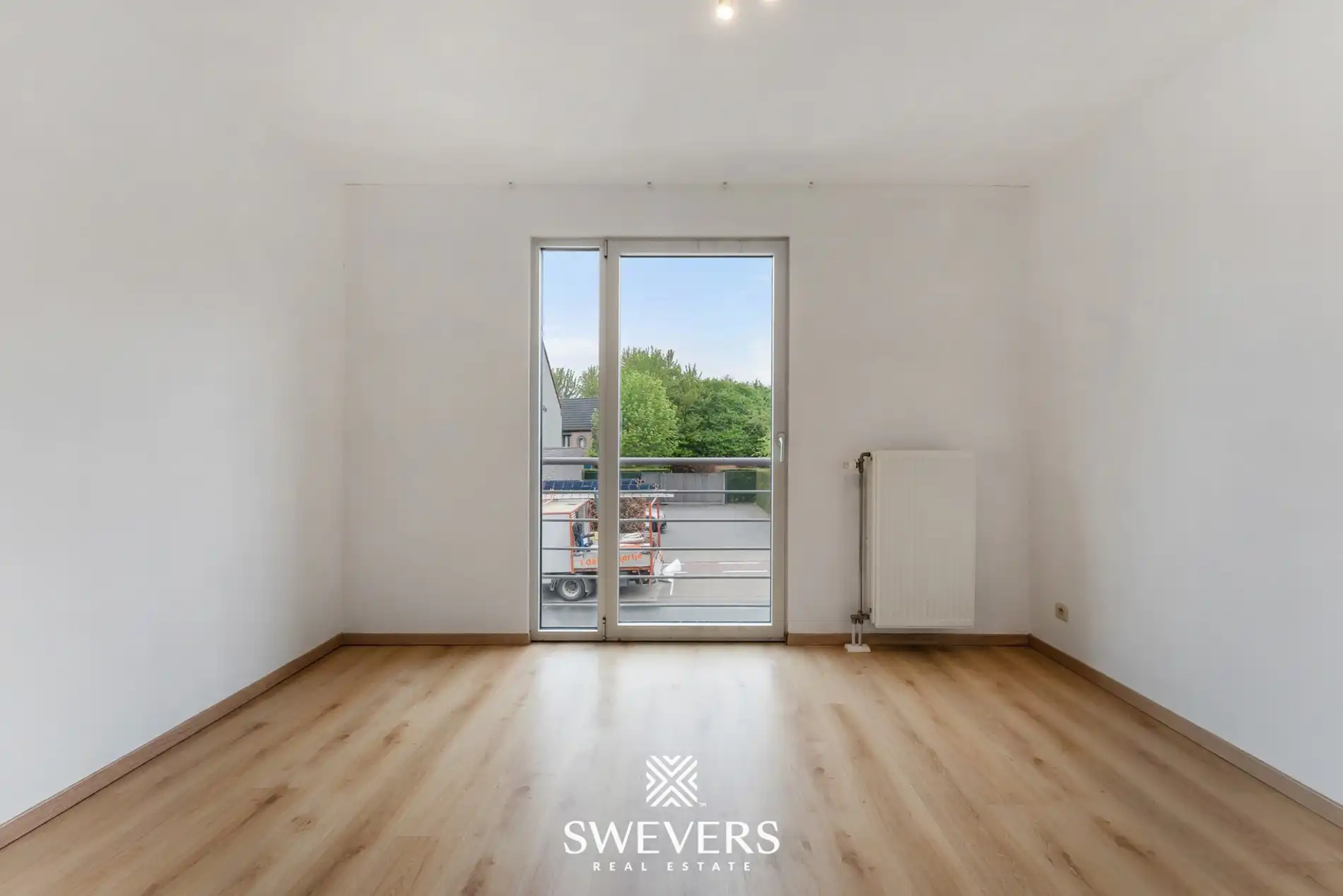 Ruim duplex appartement met 2 slaapkamers en tuin foto 12