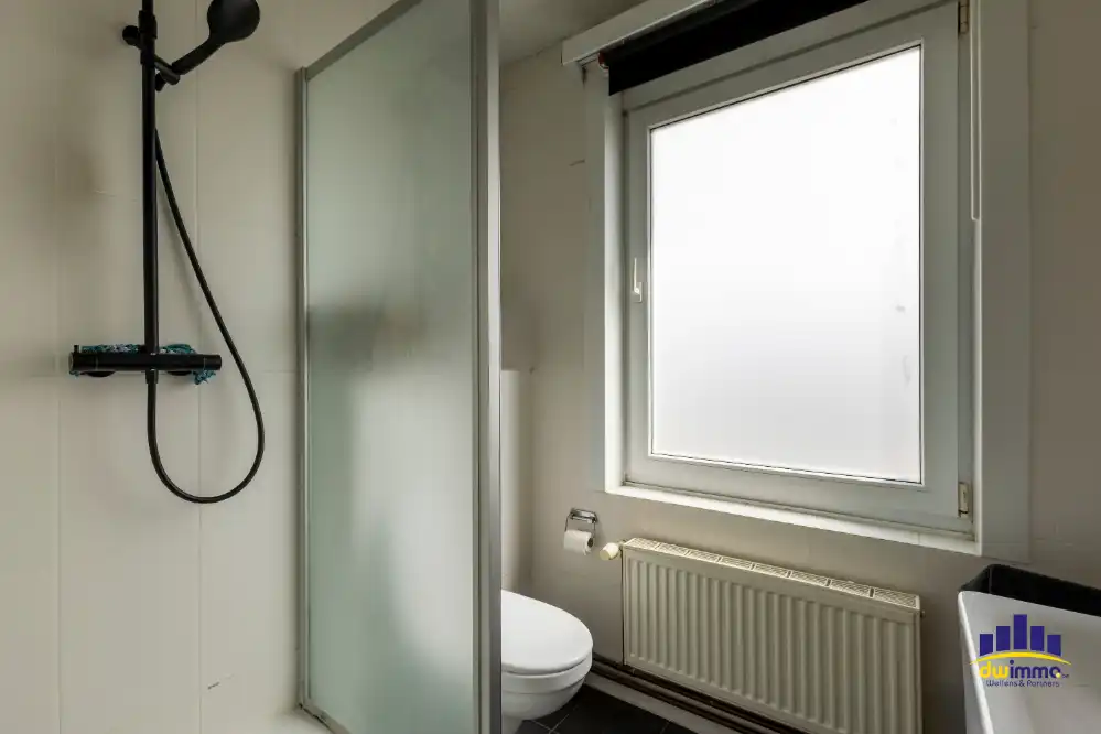 Ruime halfopen bebouwing met grote tuin in Lochristi opp. 688m² foto 13