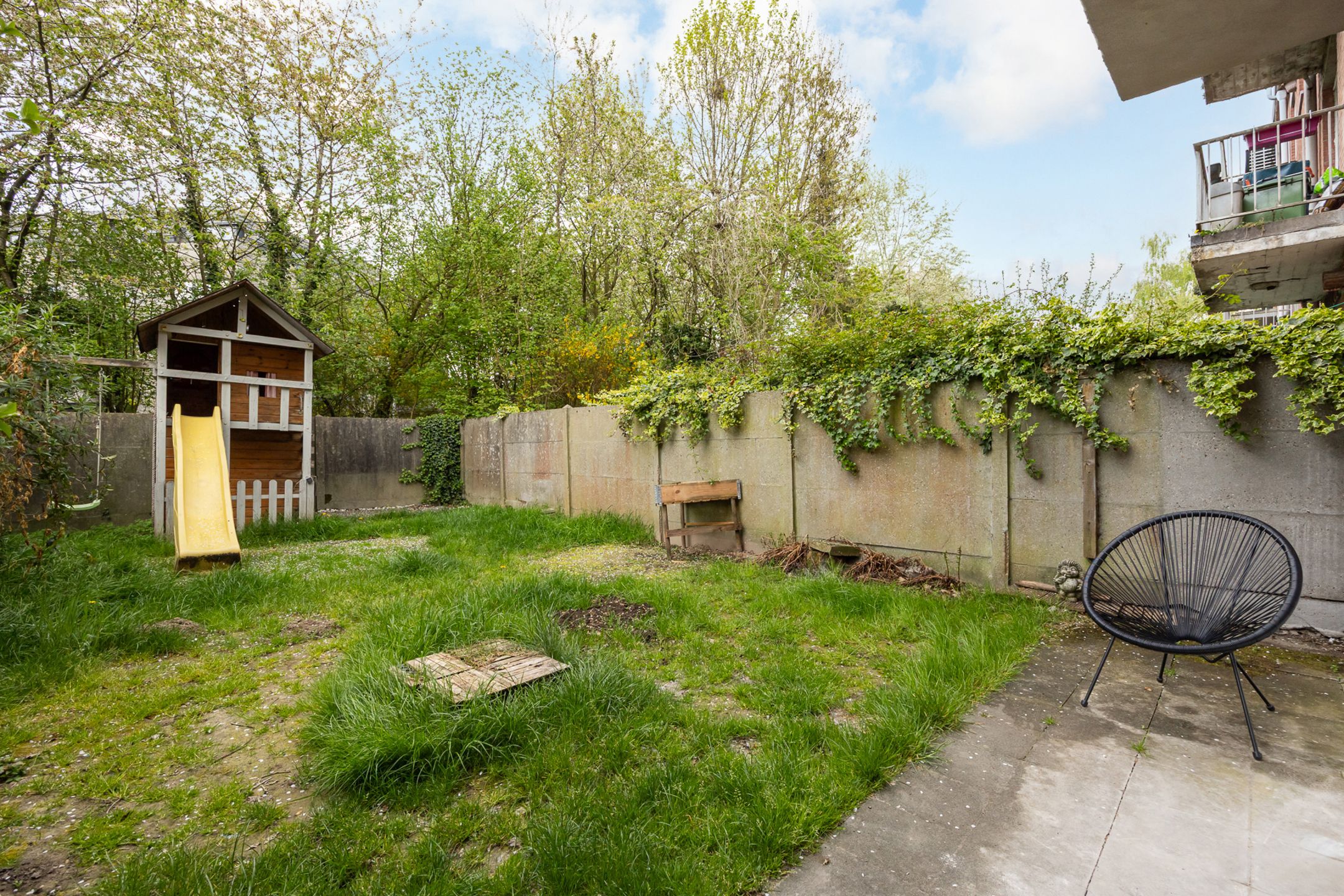 Gerenoveerd gelijkvloers appartement met tuin foto 20