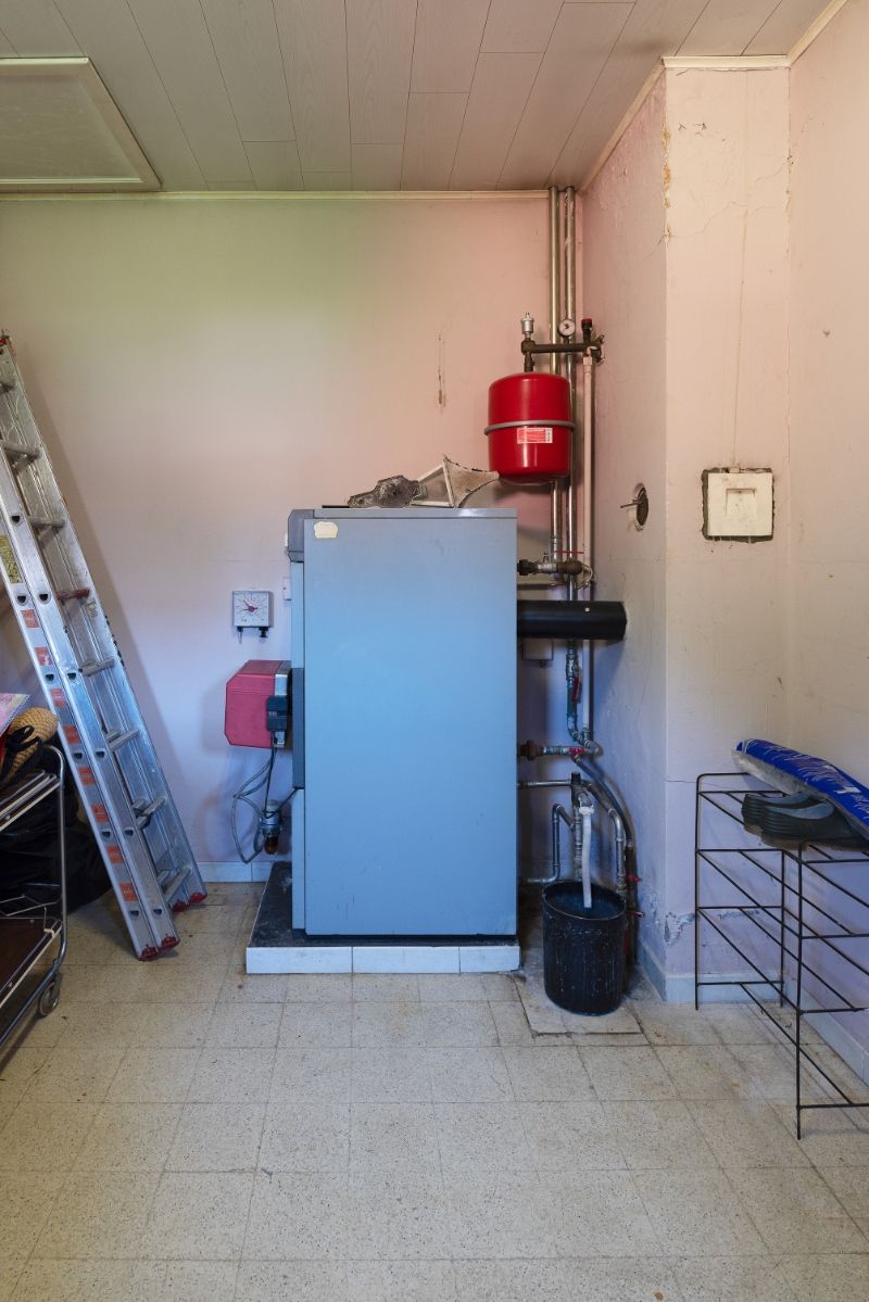 Op te frissen / te renoveren woning met tuin in residentiële buurt foto 19
