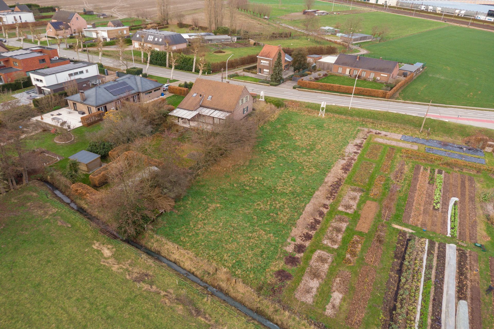 Perceel villagrond van 1983m2 & ZUID-tuin foto 8