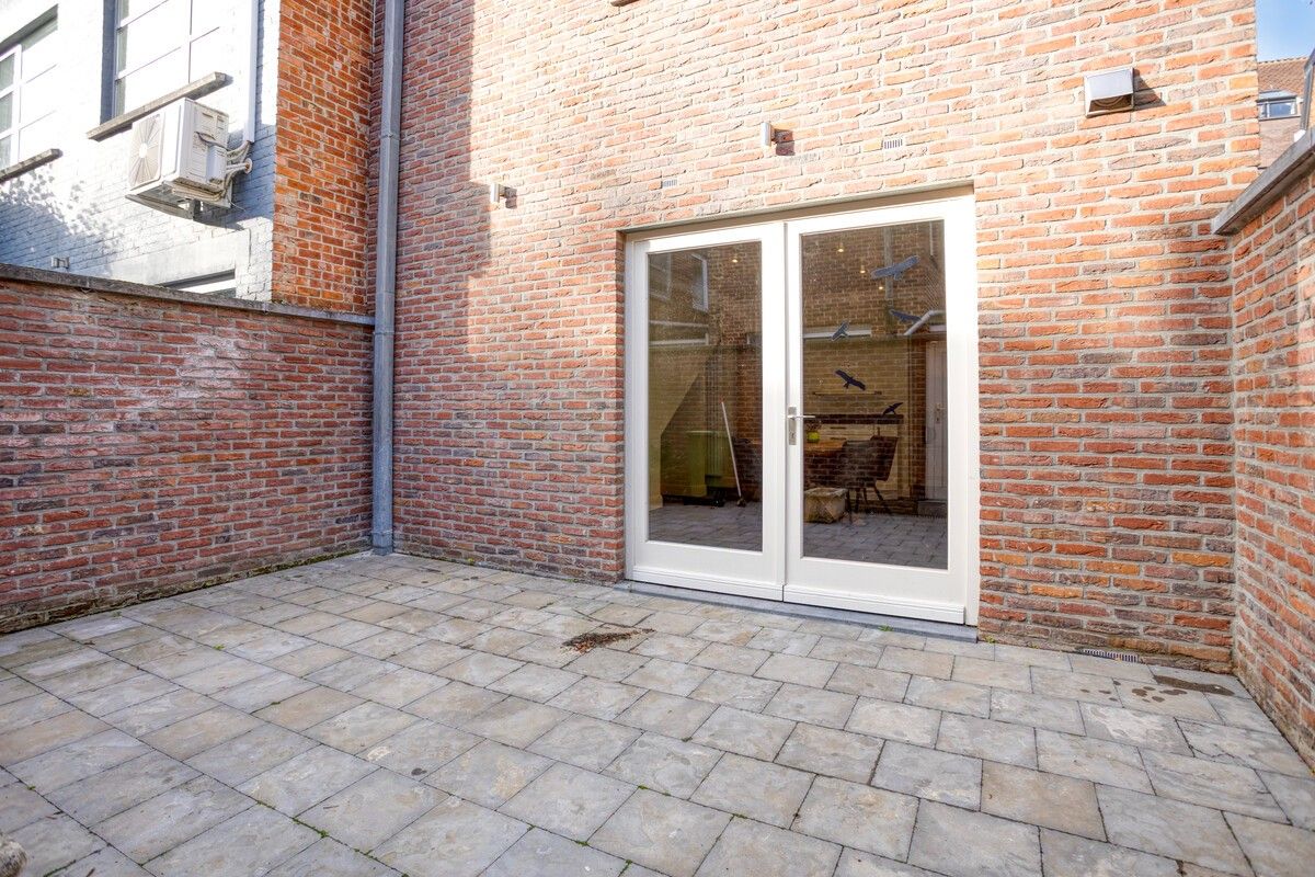 Charmante, volledige instapklare woning met twee slaapkamers en een inpandige garage in hartje Tongeren foto 27