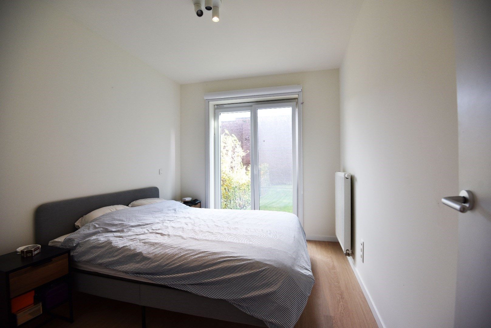 Gelijkvloers appartement met 2 slaapkamers en zonnige tuin te Maldegem centrum. foto 6