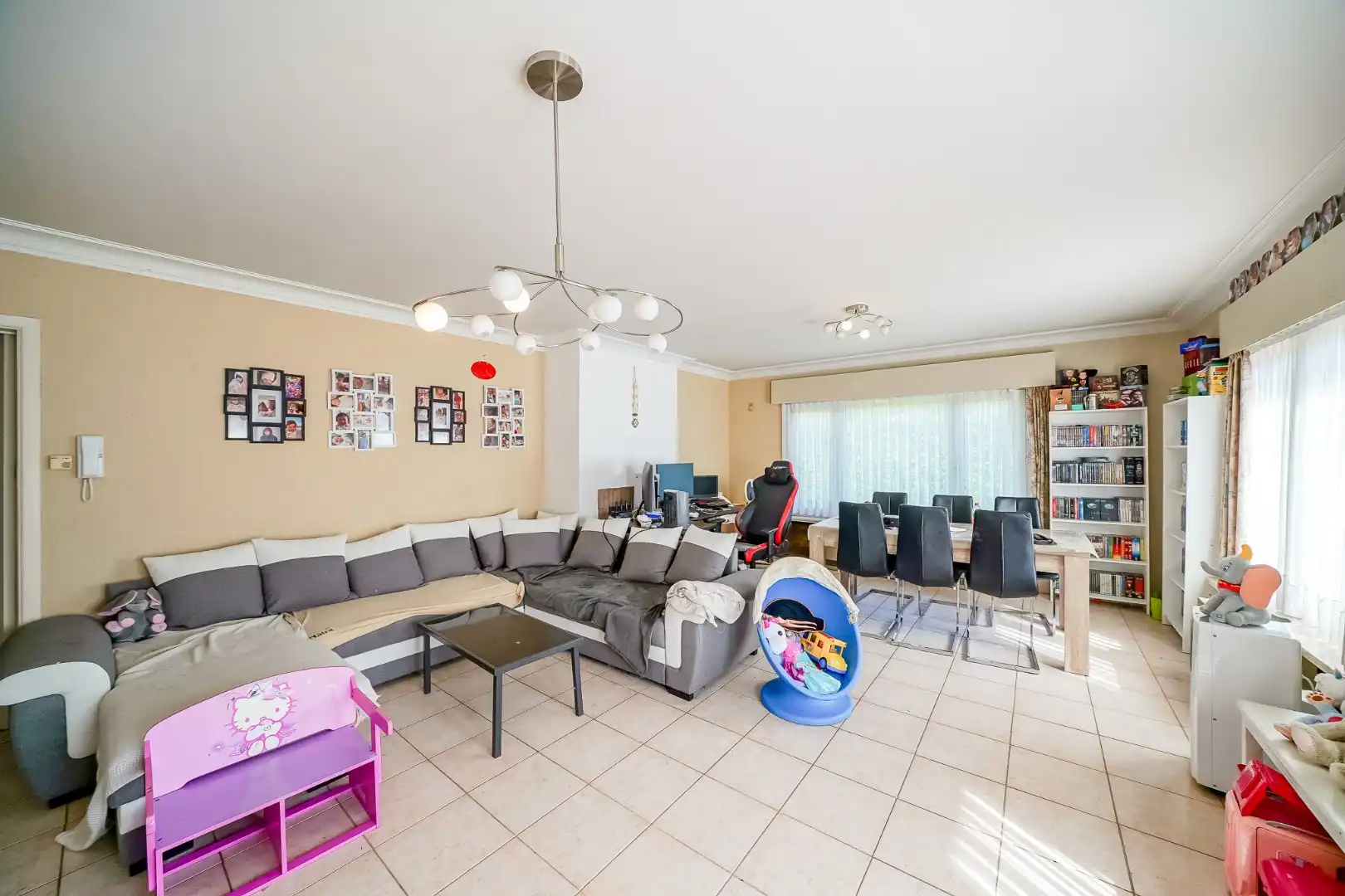 Opbrengstwoning met 2 verhuurde appartementen, tuin en 2 garages in Stene foto 3