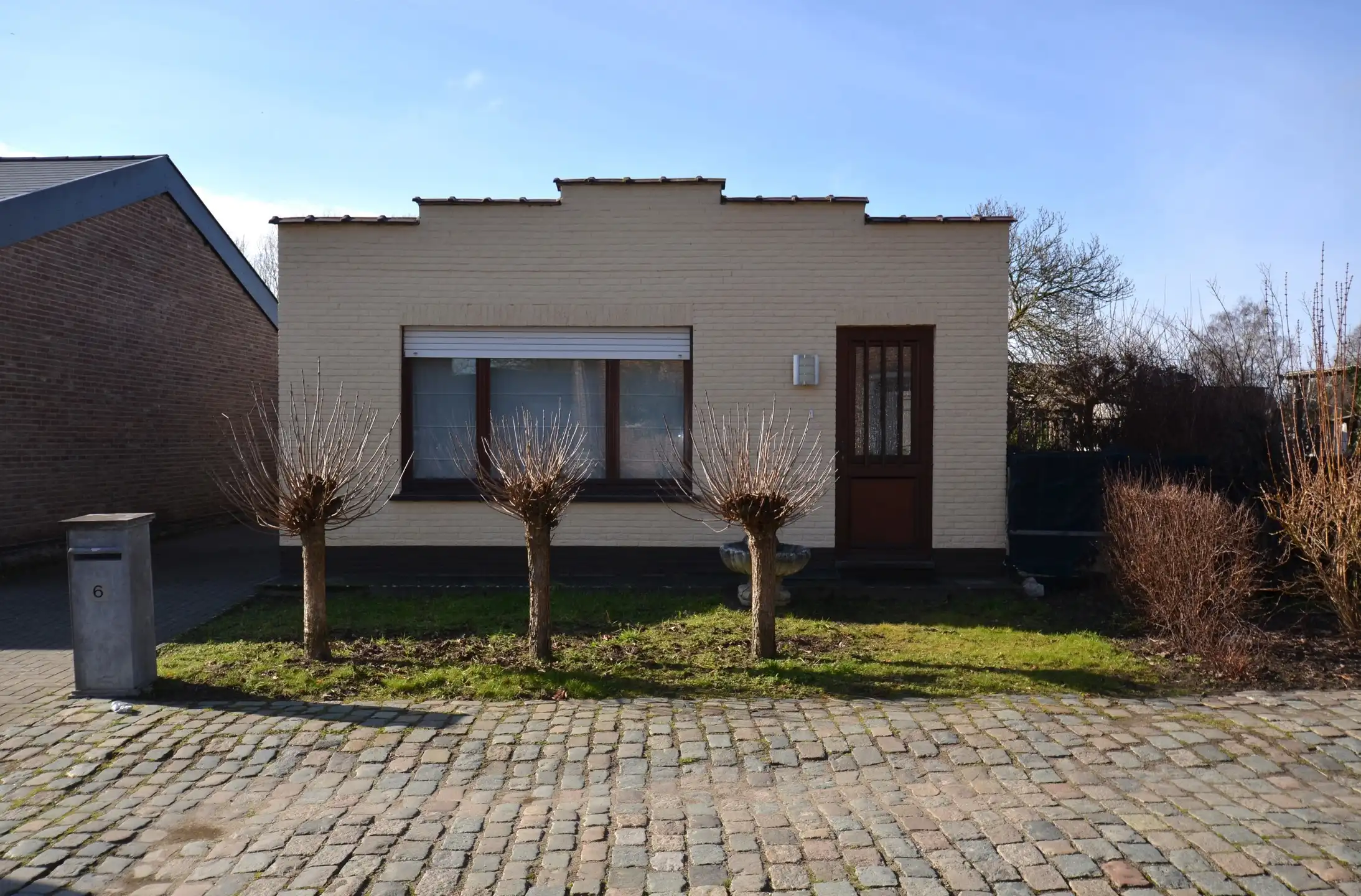 Knusse te renoveren laagbouw op TOP-ligging foto 2