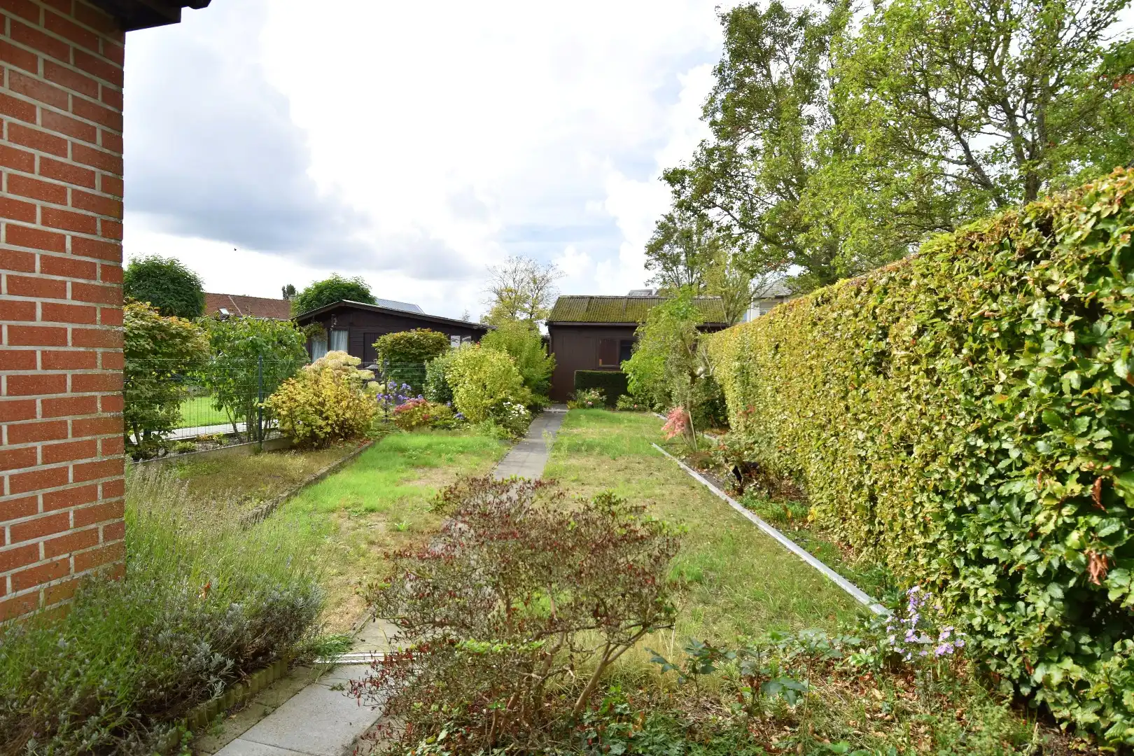 Woning op hoekperceel met 3 slaapkamers, garage en zalige tuin te koop in Gullegem foto 11