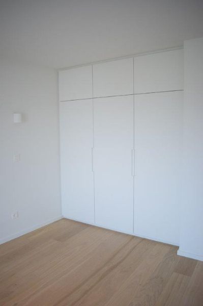 Trendy gerenoveerd app met 2 slaapkamers en garage box. foto 11