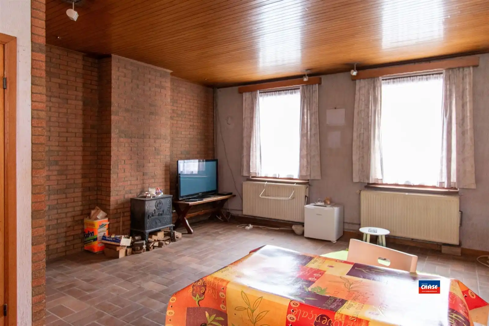 Te renoveren rijwoning met magazijn foto 3