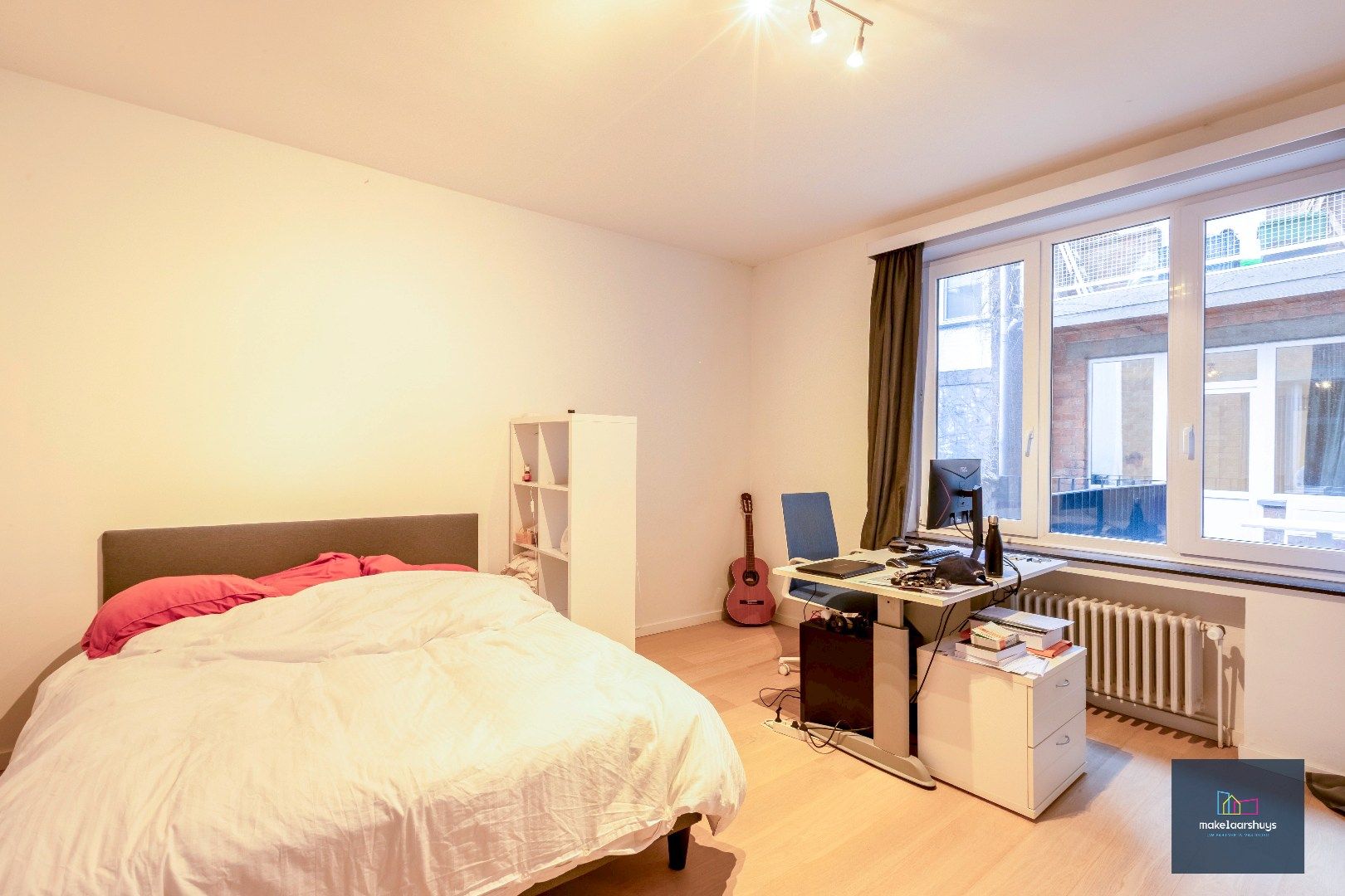 Mooi en centraal gelegen 2 slaapkamerappartement met terras en staanplaats foto 14