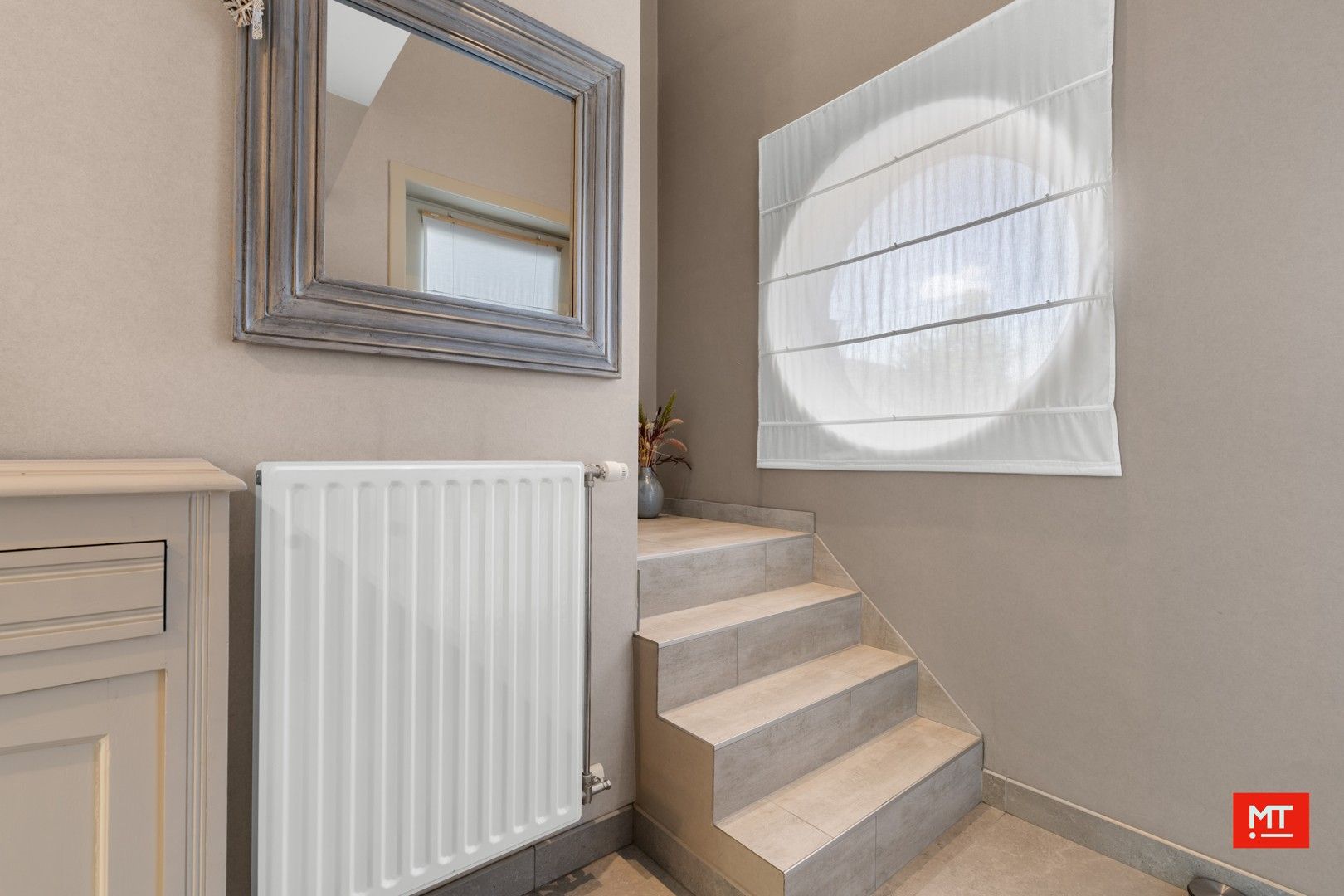 Instapklare woning met 3 slaapkamers, tuin en garage, gelegen in een rustige wijk in hartje Zonnebeke foto 9