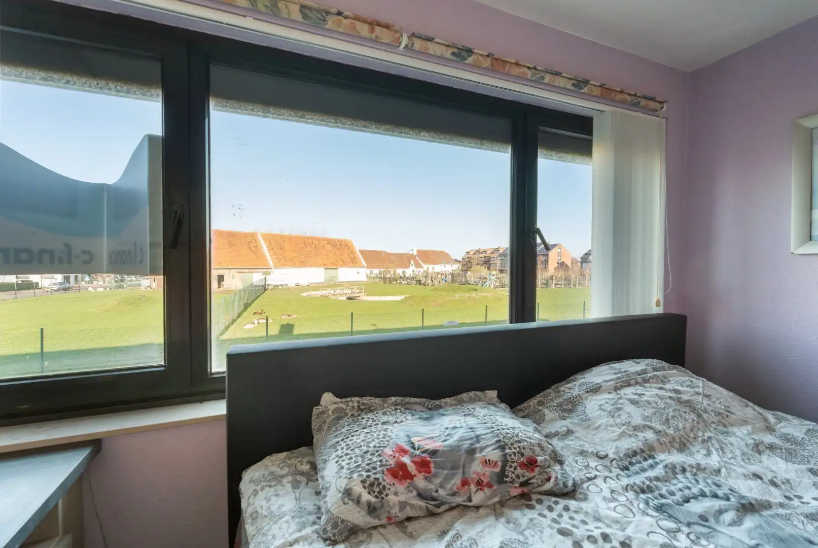 Charmante rijwoning met zonnig terras, wellnessruimte en garagebox in de Vicognewijk foto 13