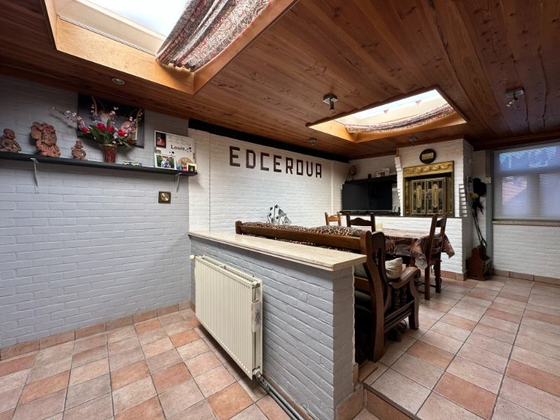 Ruime gezinswoning met grote tuin, veranda en veel opbergruimte foto 6