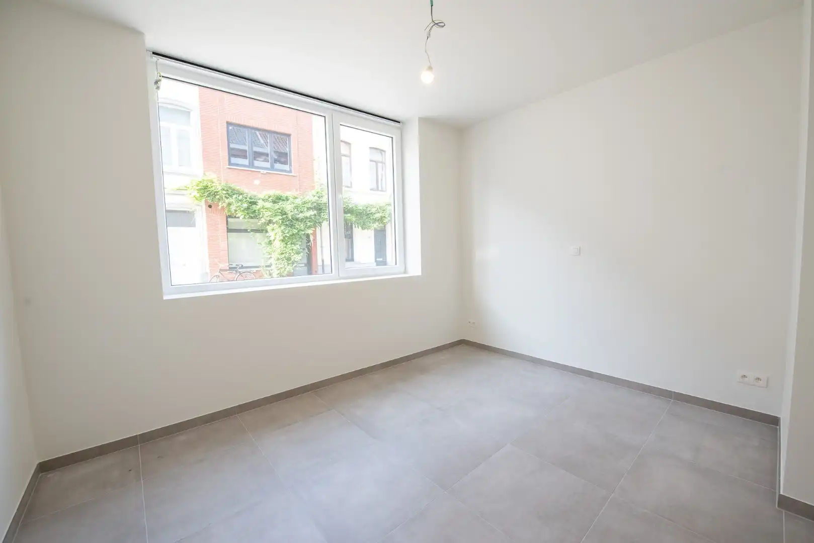 Instapklaar éénslaapkamerappartement met stadstuin foto 9