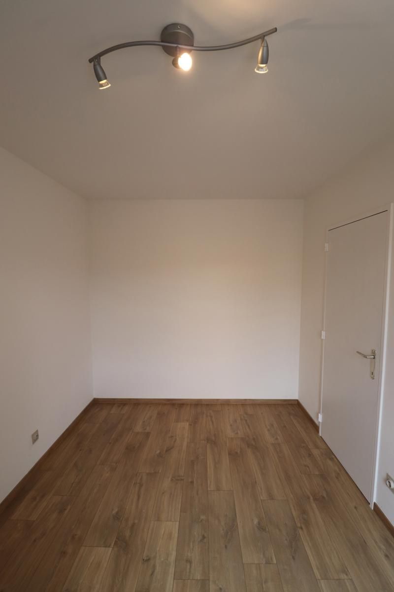 Een gerenoveerd appartement op de eerste verdieping achteraan met autostaanplaats foto 7