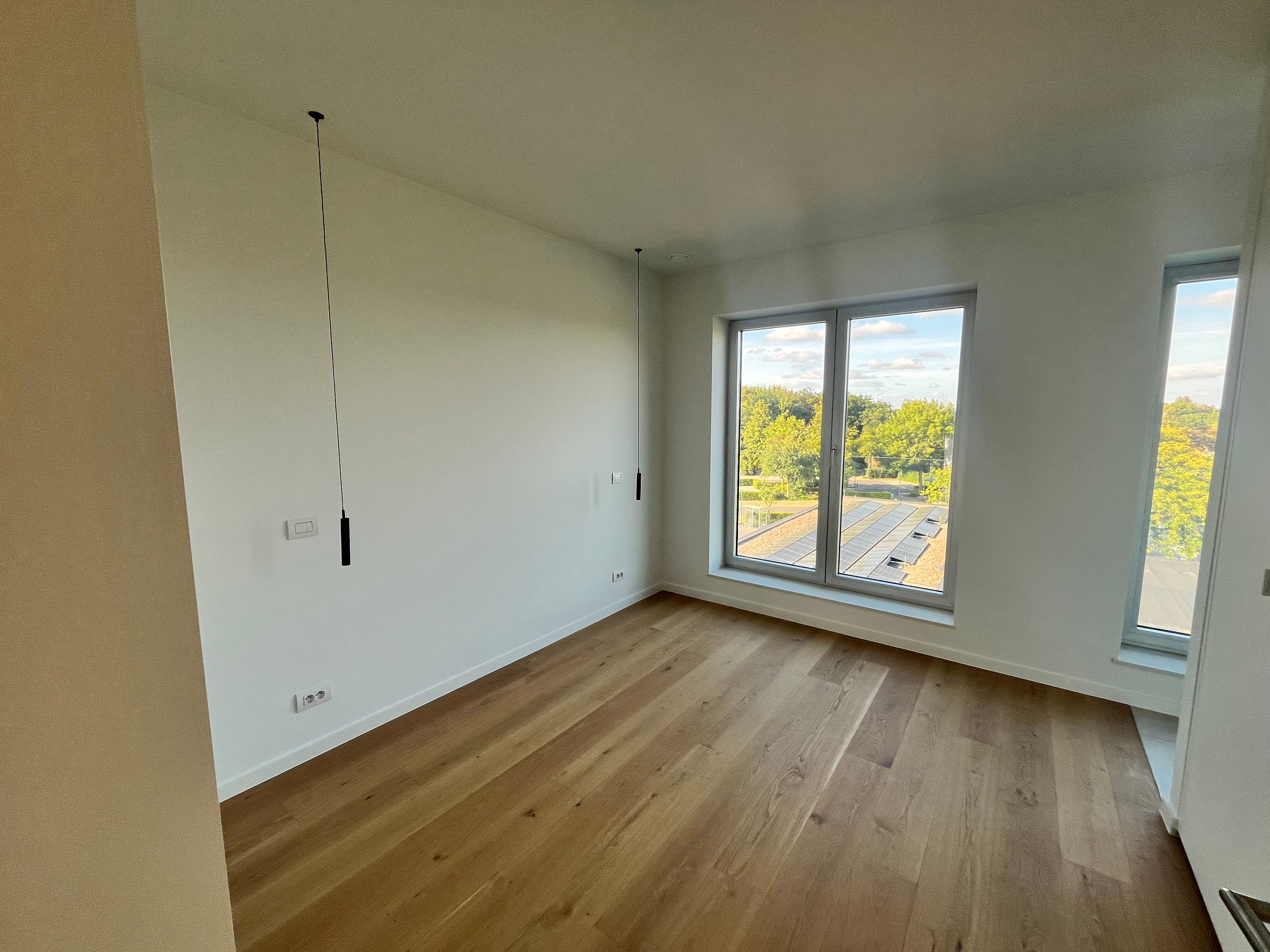 Instapklaar nieuwbouwappartement te huur in hartje Eeklo! foto 7