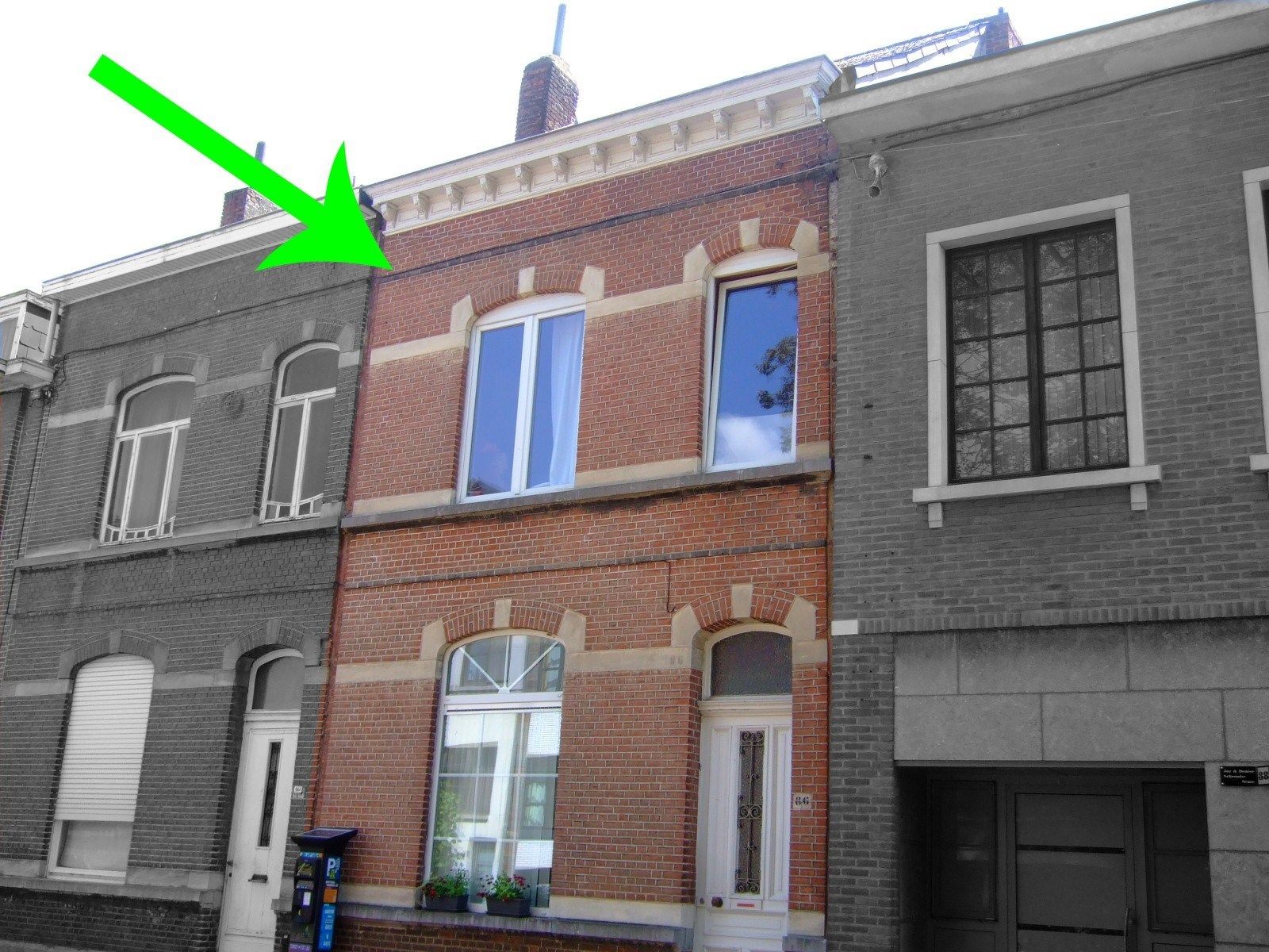 WONING IN CENTRUM AARSCHOT MET TUIN foto {{pictureIndex}}