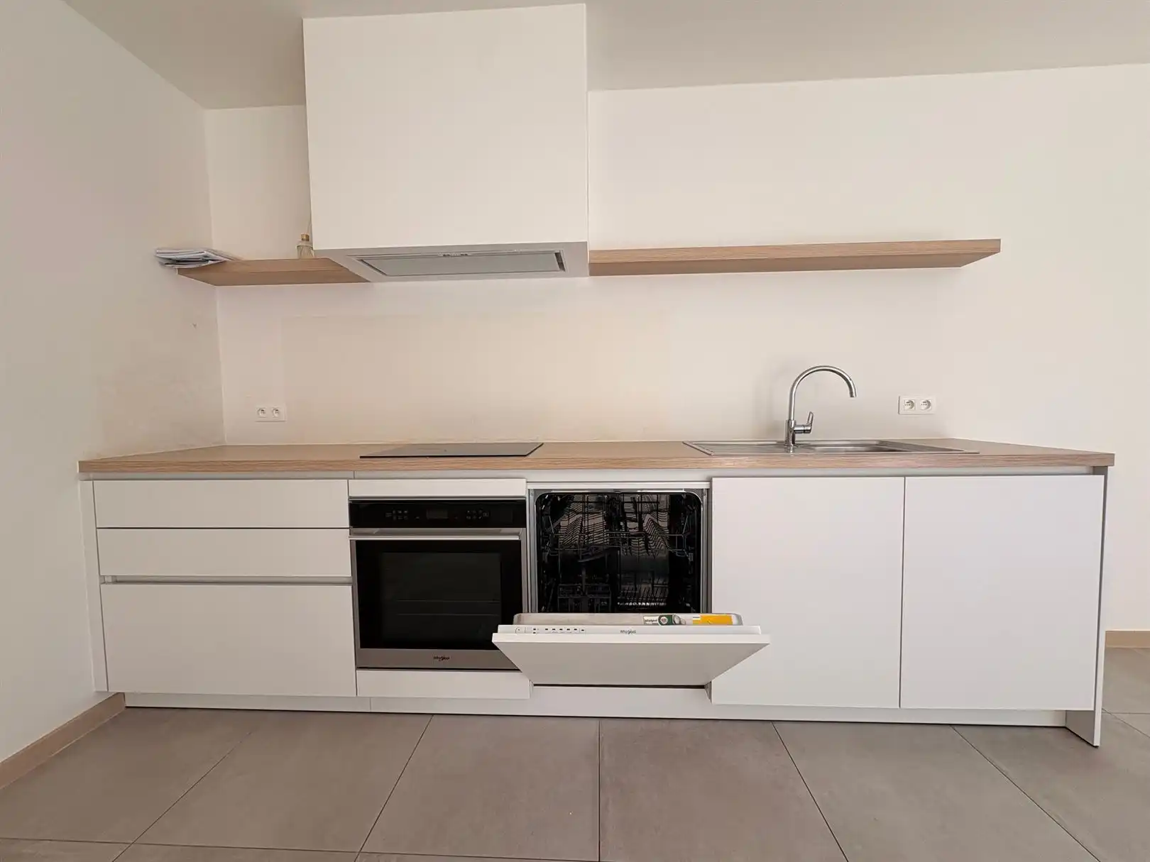 Modern en instapklaar gelijkvloers appartement met terras, tuin en ondergrondse staanplaats in Grembergen foto 6