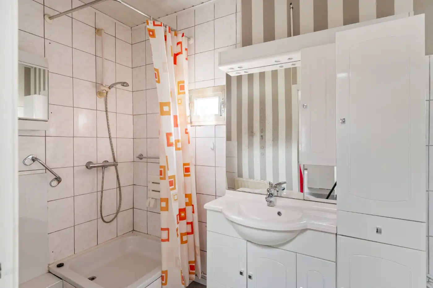 Leuke starterswoning met 2 slpk., garage en gezellig west-tuintje foto 9