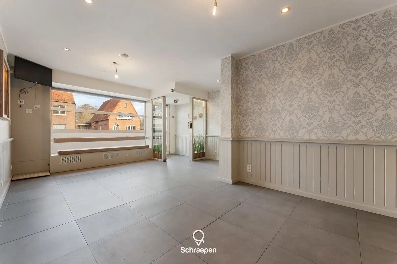 Charmante woonst met handelsruimte op absolute toplocatie in Zonhoven-centrum! foto 6