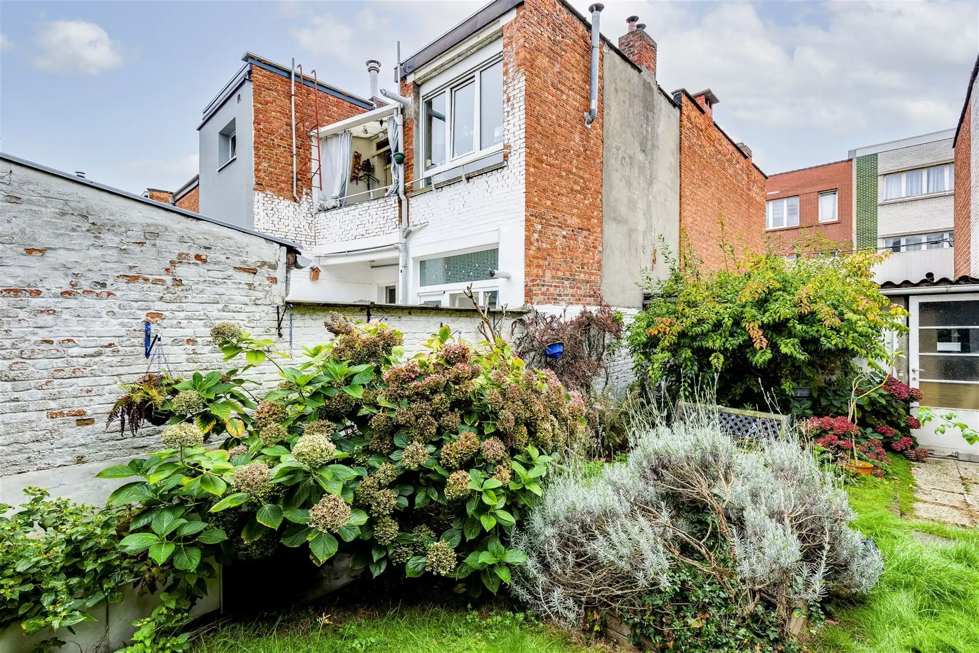 Te renoveren woning met tuin in Merksem foto 15