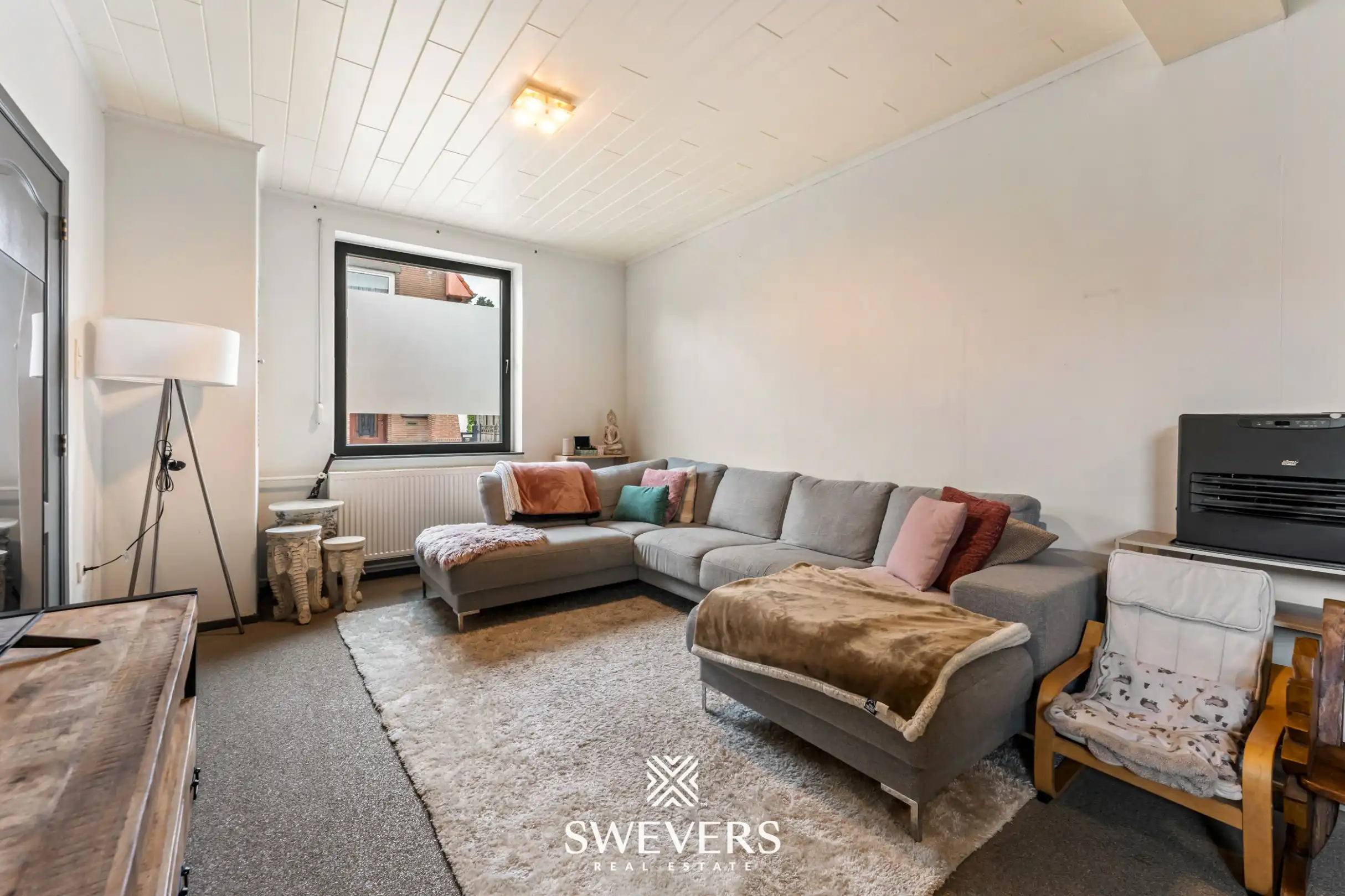 Instapklare halfopen woning met ruime leefruimte en zonnige tuin in Lanaken  foto 2