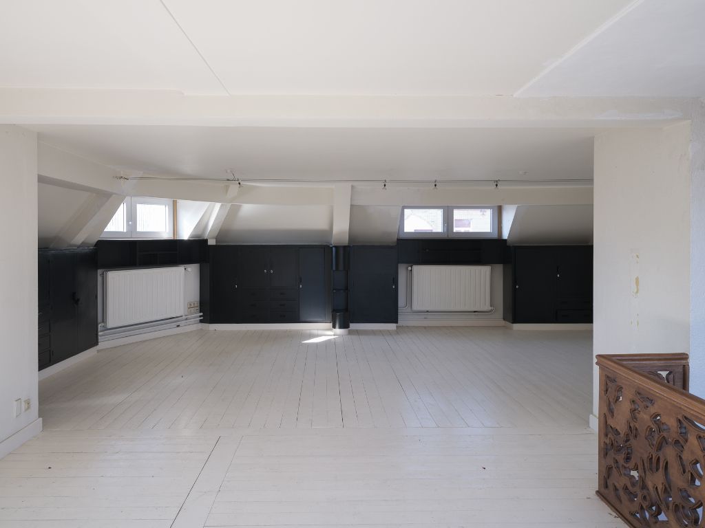 Voormalige dokterswoning met praktijkruimte en stadstuin foto 18